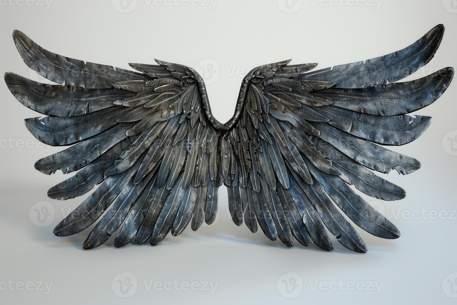 Large detailed metallic bird wings standing up on white background photo