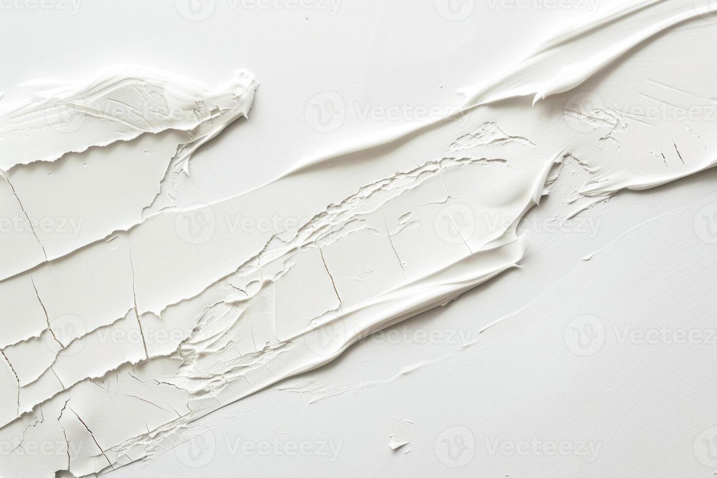 White acrylic paint texture forming an abstract pattern photo
