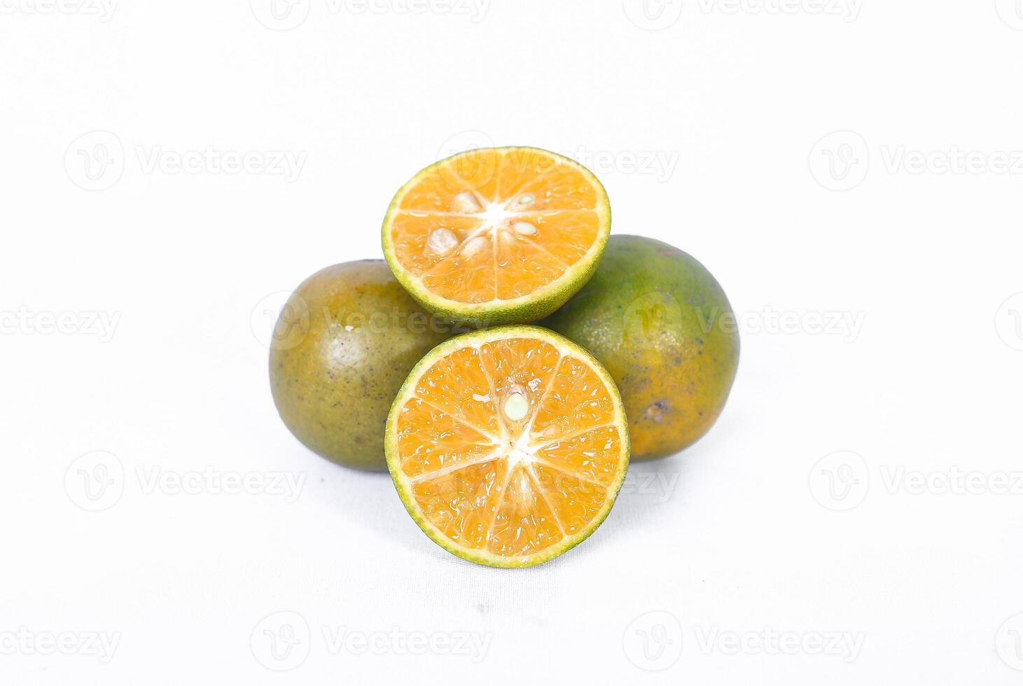 Green orange fruit or Tangerine orange with cut in half isolated on white background. Clipping path photo