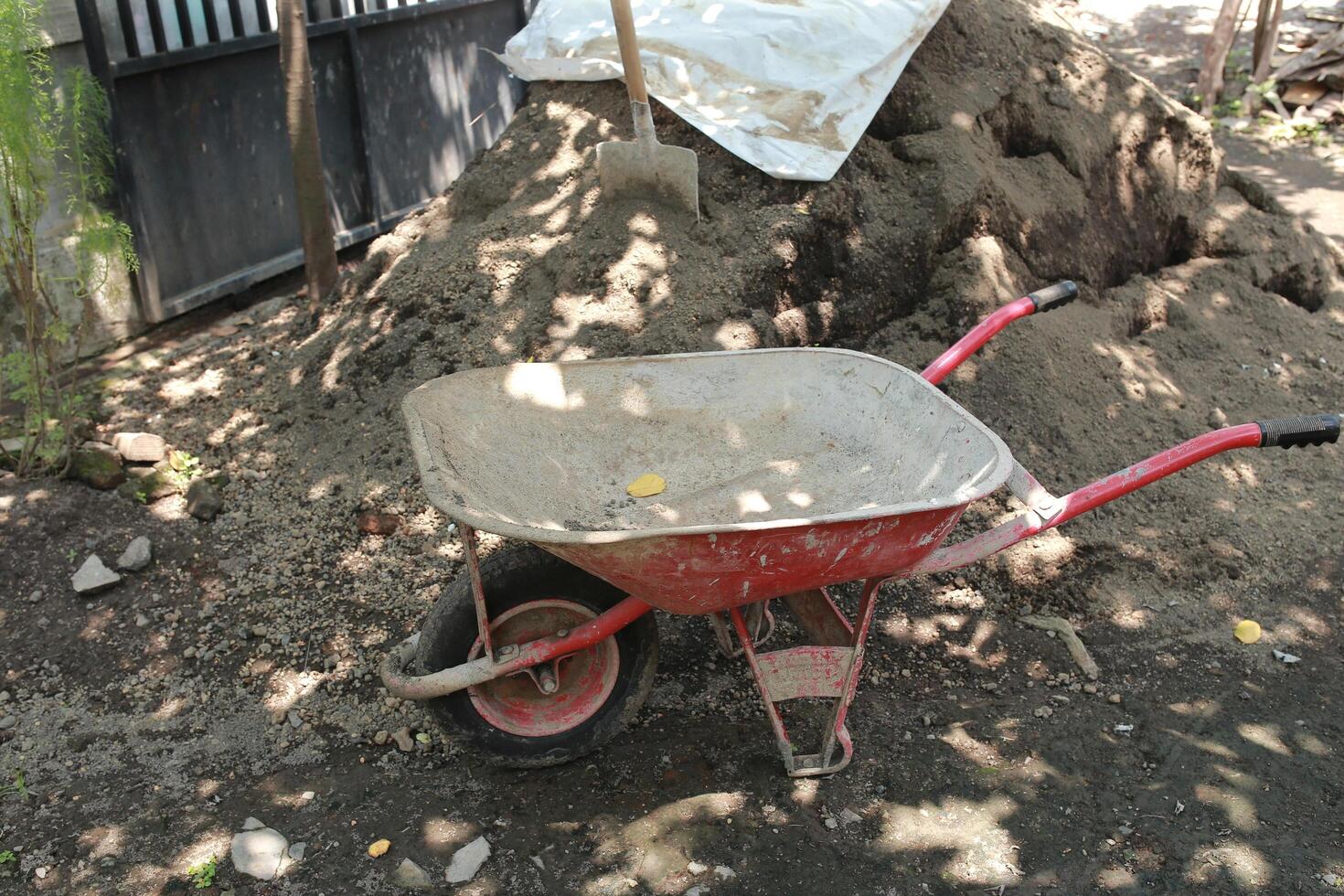 close up Artco or cement cart is used to transport cement sand and stone photo