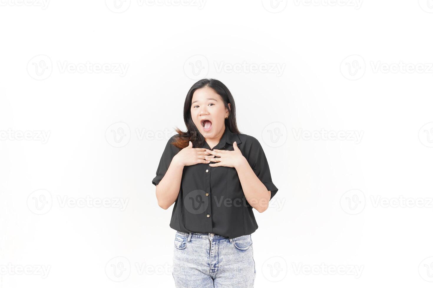 Young Asian woman shocked amazed face gesture wearing Black t-shirt and jeans isolated on white background photo