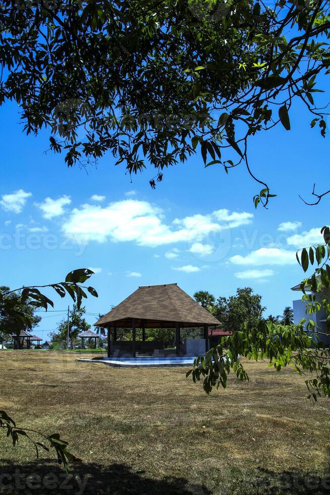 This photo of a modern garden and gazebo is suitable for collection