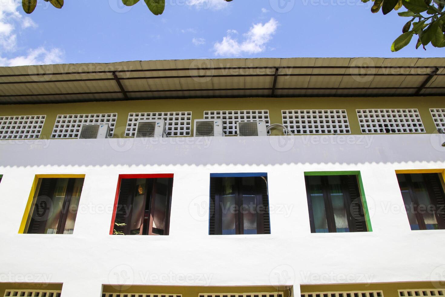 Artistic modern school building seen side and front in bright daylight photo
