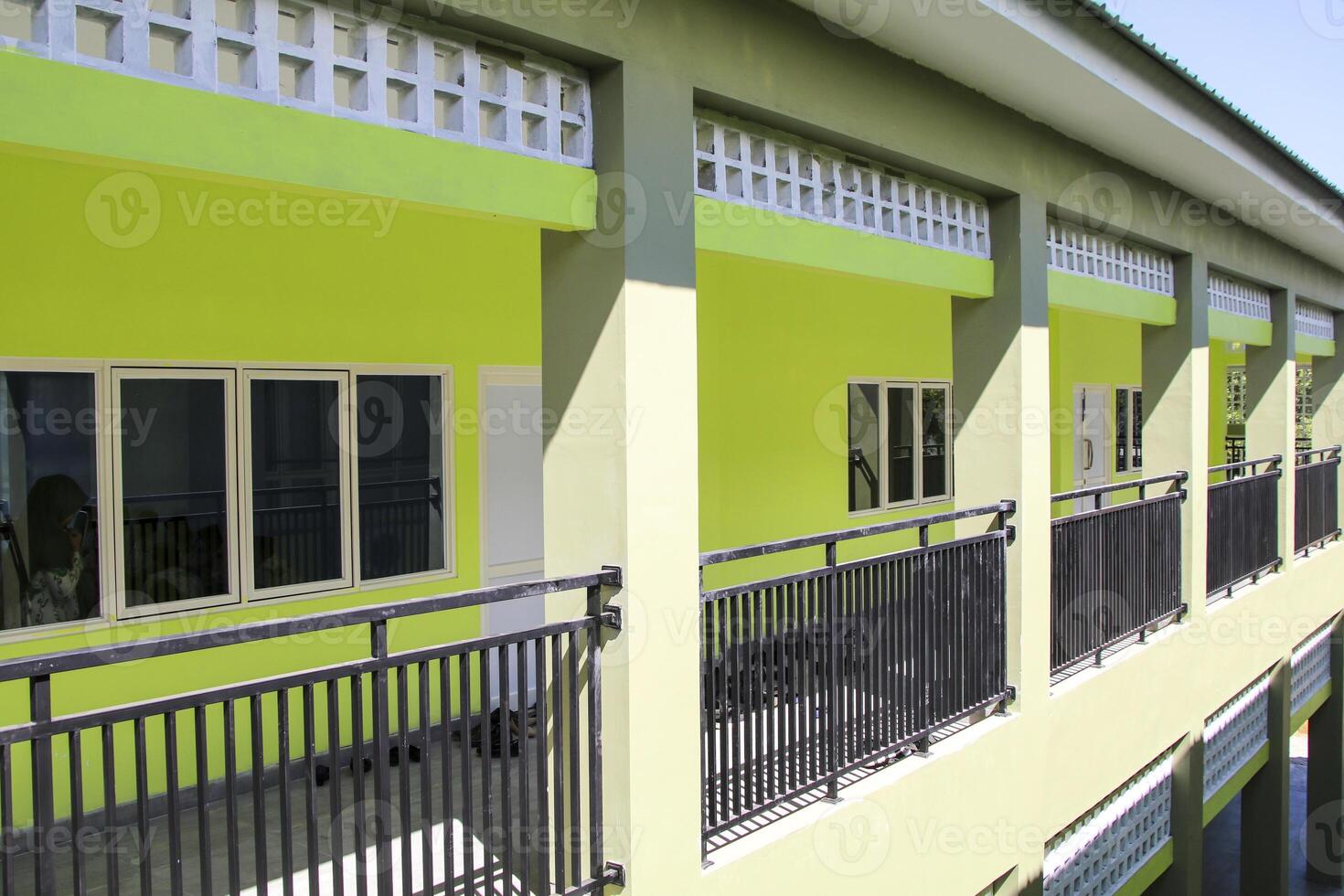 Artistic modern school building seen side and front in bright daylight photo