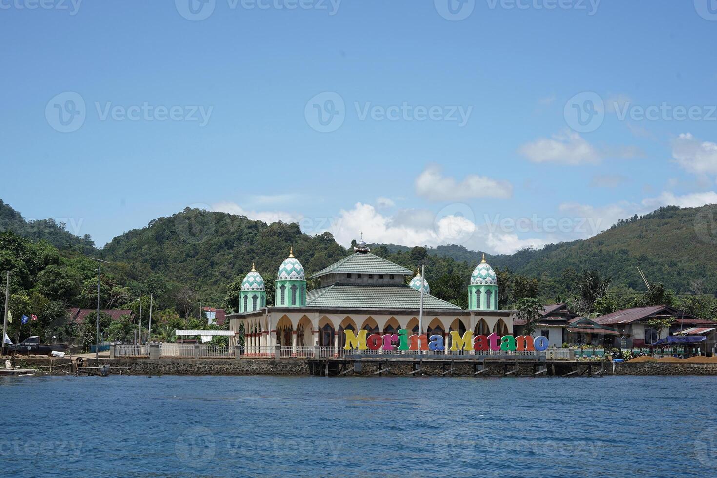 Photo of the mosque in Matano Village which is located on the edge of Lake Matano, East Luwu, Indonesia