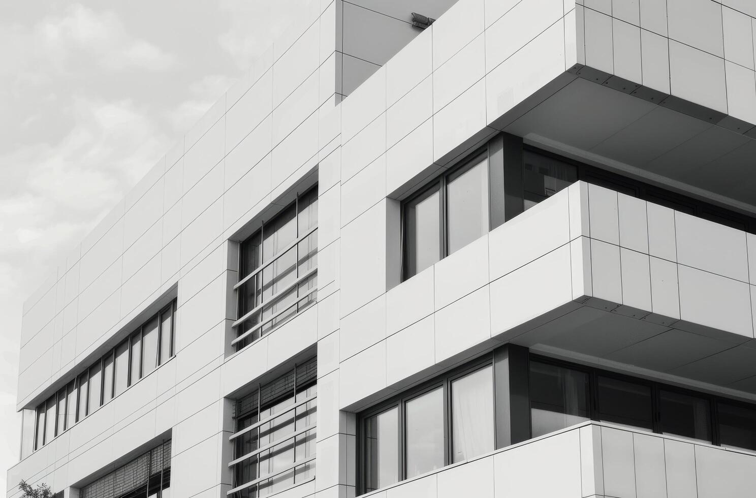 Modern Architectural Building With Sleek Lines and Large Windows in Urban Setting photo