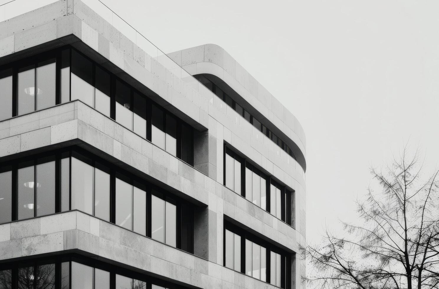 Modern Architectural Building With Sleek Lines and Large Windows in Urban Setting photo