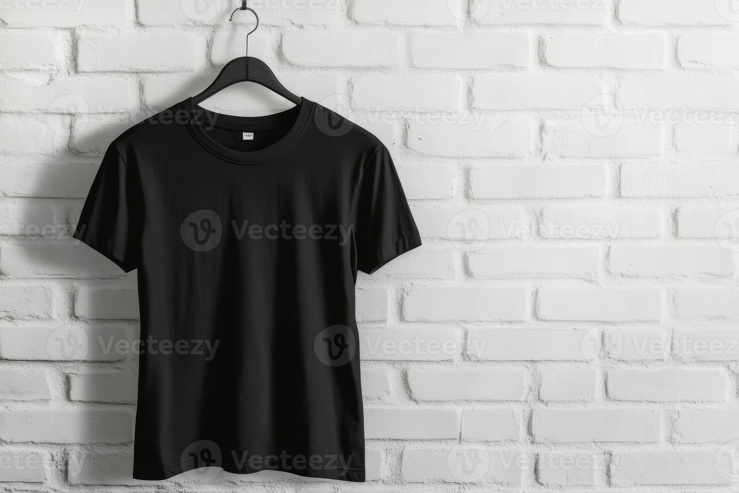 A stylish versatile black tshirt showcased elegantly on a hanger, making it ideal for everyday casual wear photo