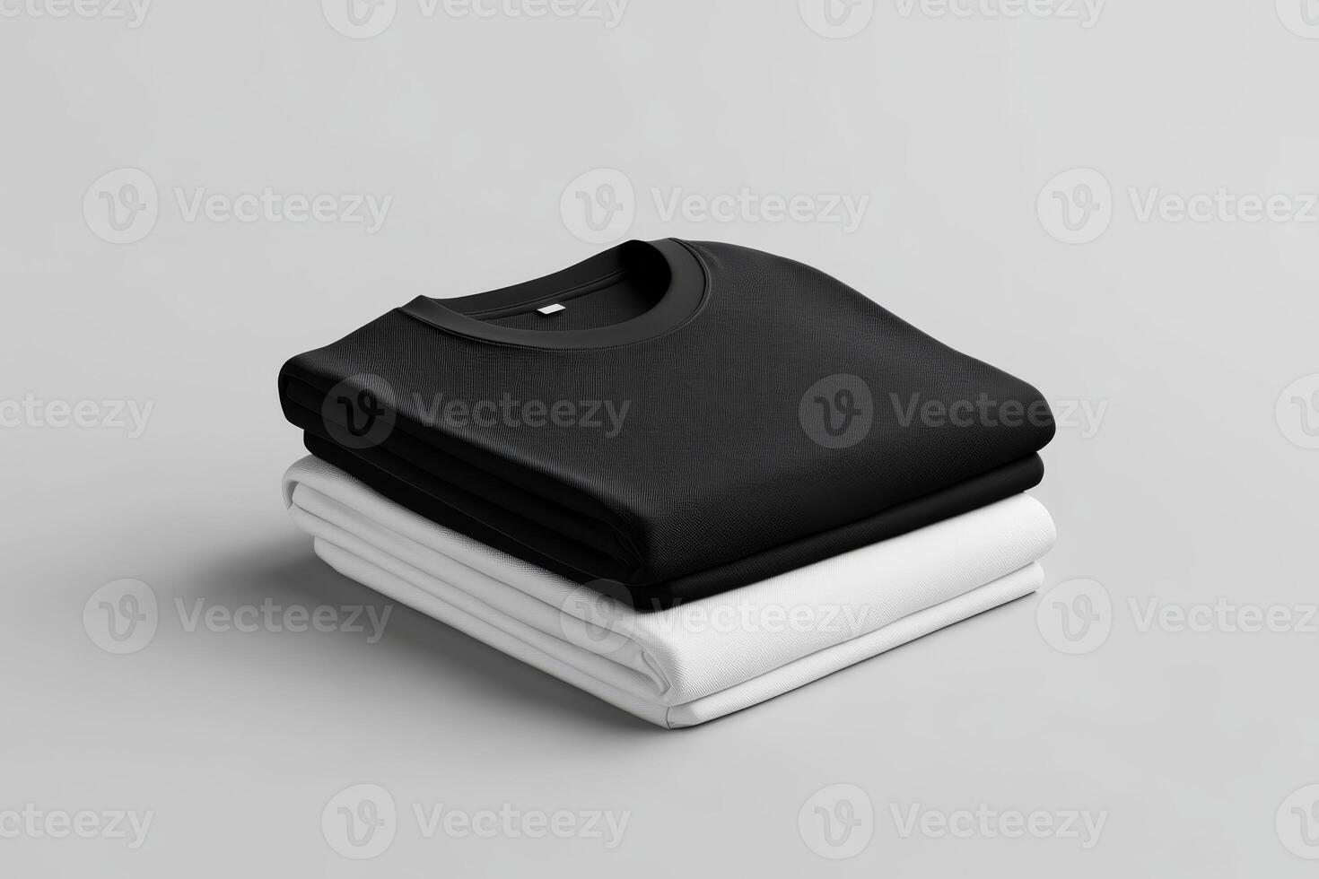 Here is an elegant and sleek mockup featuring a set of folded black and white square tshirts. These tees are perfect for effectively showcasing your unique minimalist fashion style and approach photo