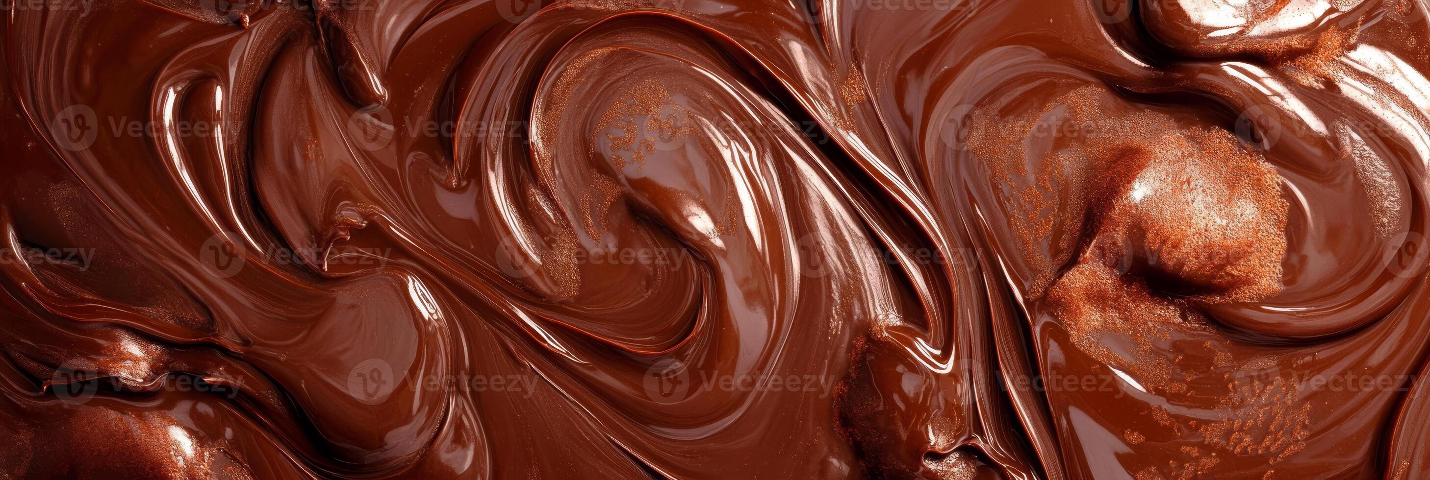 This captivating image features glossy melting chocolate artfully swirled, evoking pure indulgence and delight due to its tempting appearance, making it truly irresistible and appealing photo