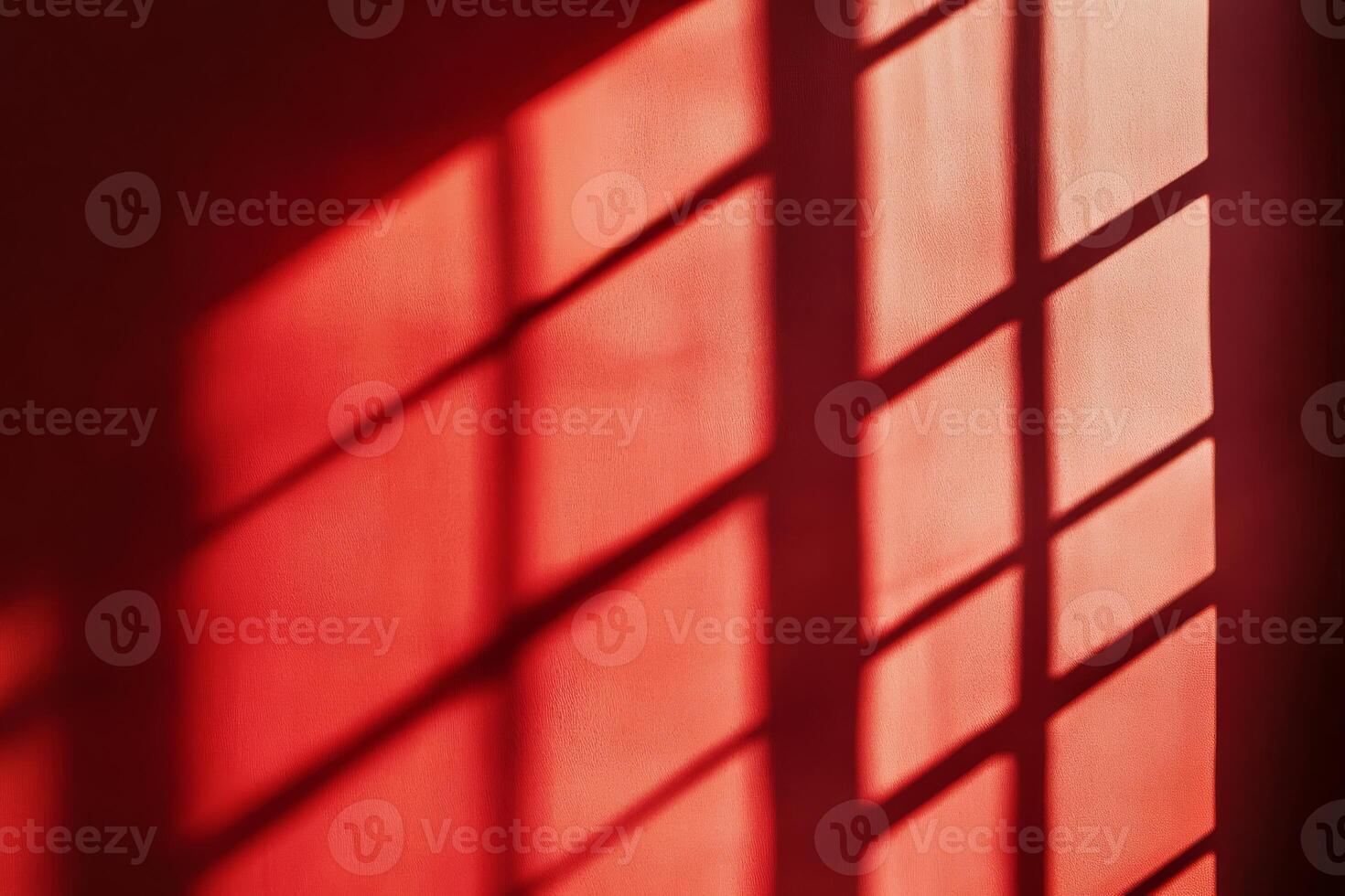 A captivating play of light is gracefully casting intricate red shadows while creating a warm and artistic ambiance photo