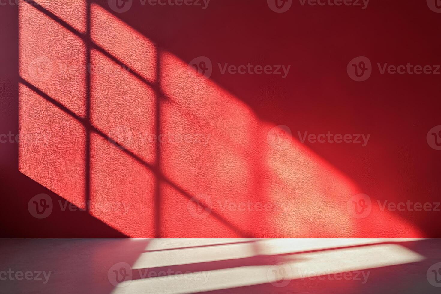 A stunning view of elongated shadows on a vibrant red wall, showcasing a remarkable interplay of light and color photo