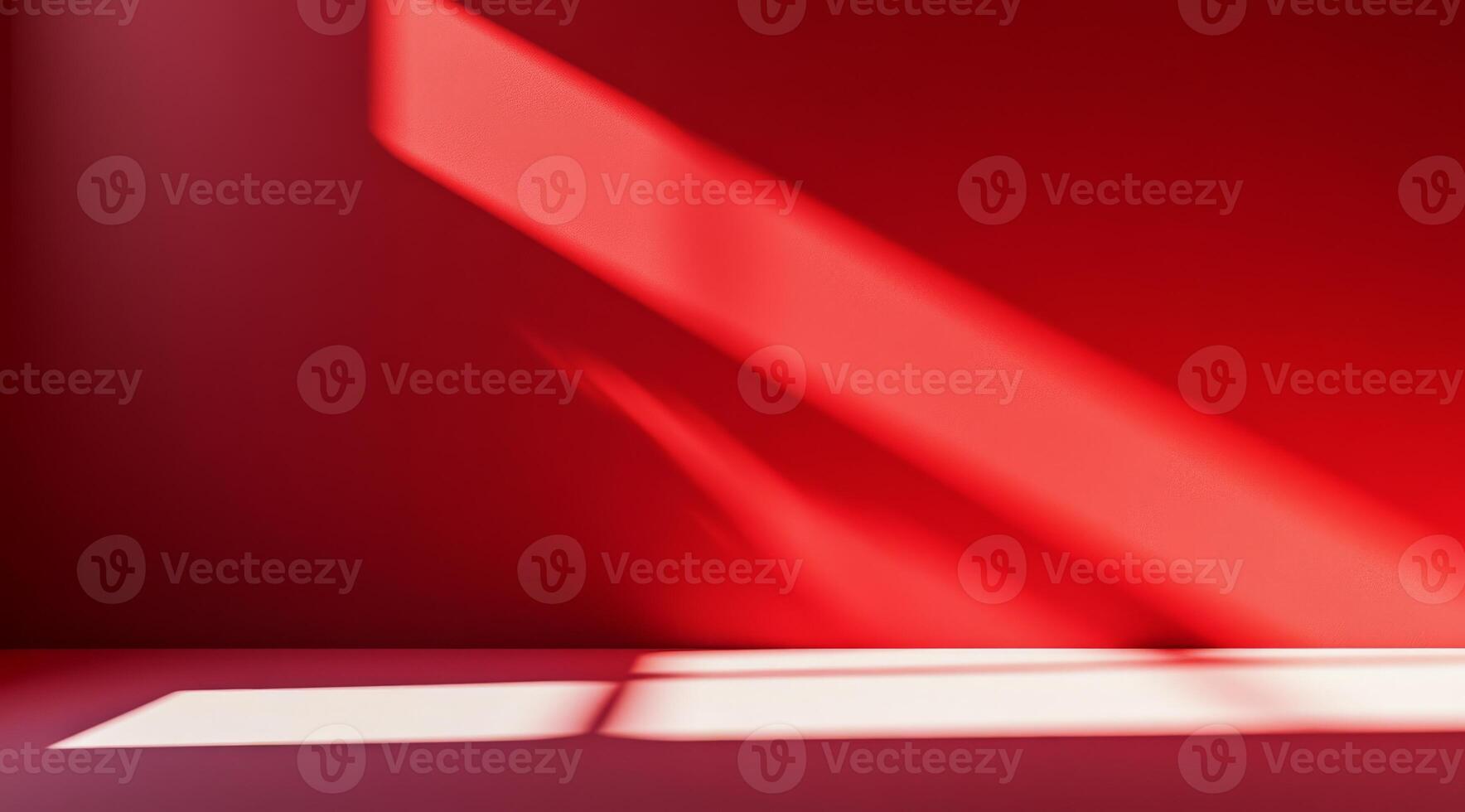 A striking red wall prominently showcasing dynamic shadows that enhance its modern aesthetic appeal and intrigue photo