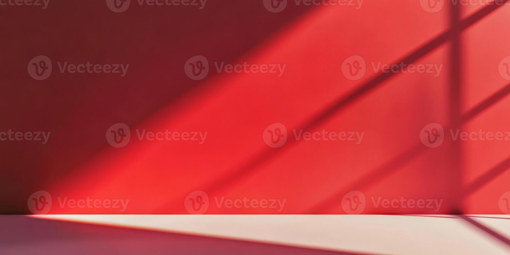 A vibrant, striking red wall casting intricate shadows, showcasing the fascinating interplay of light and color photo