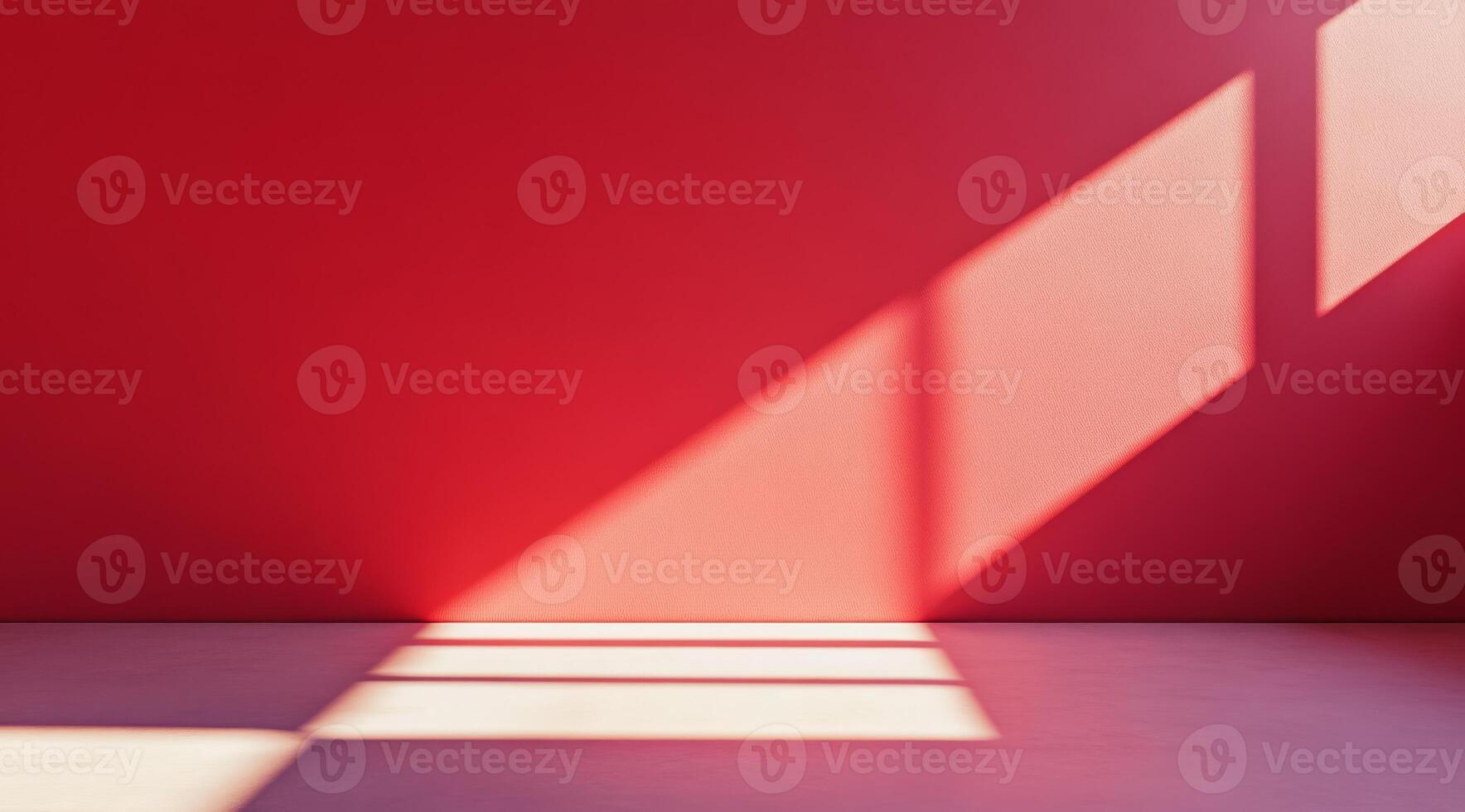 A beautifully vibrant red wall that casts intriguing shadows while showcasing stunning geometric light patterns photo
