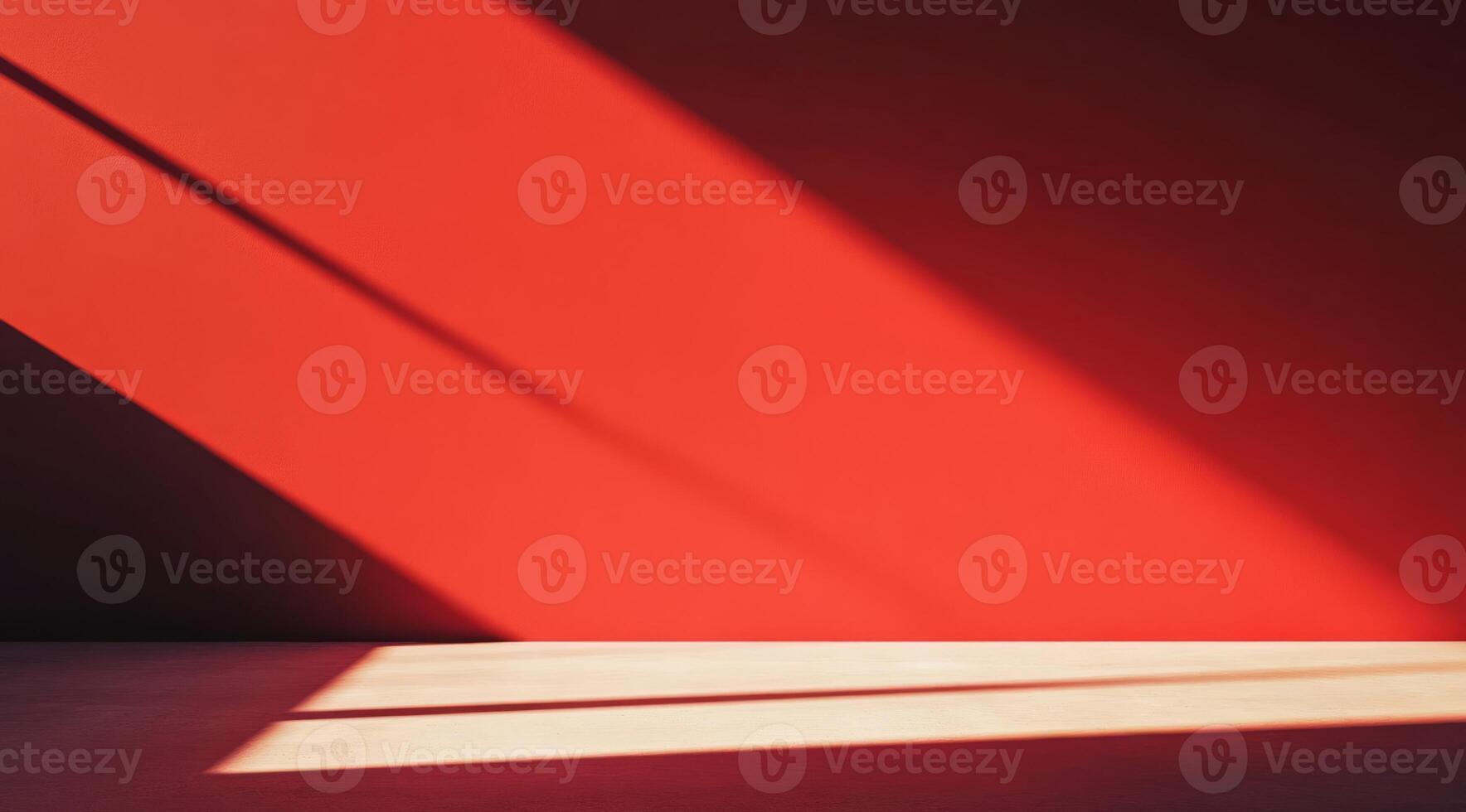 A striking display of intricate shadows on a vivid red wall, showcasing a bold color contrast that captivates photo