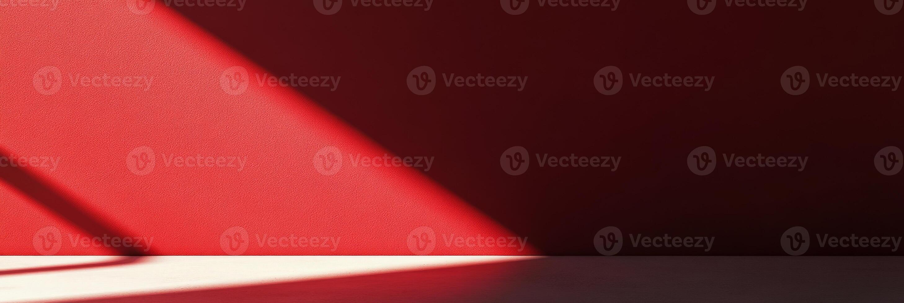 This is a striking composition that features light and shadow against a vibrant red background, ideal for modern design photo