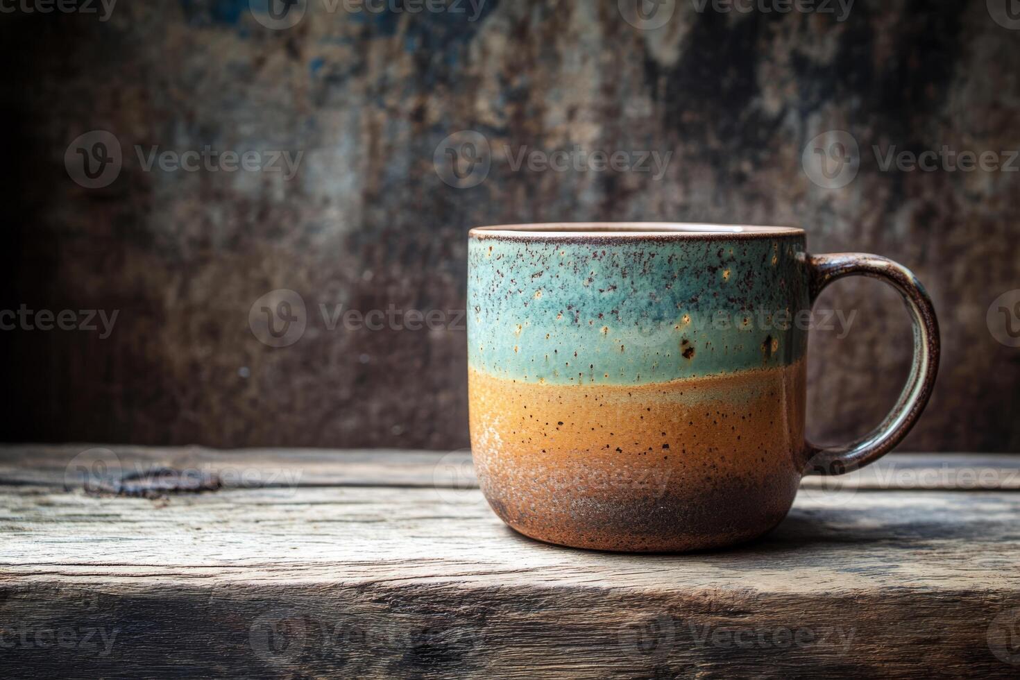 This beautifully crafted ceramic coffee cup showcases stunning earthy tones of blue and orange, making it the perfect choice for enjoying your favorite hot or cold beverage with elegance and style photo