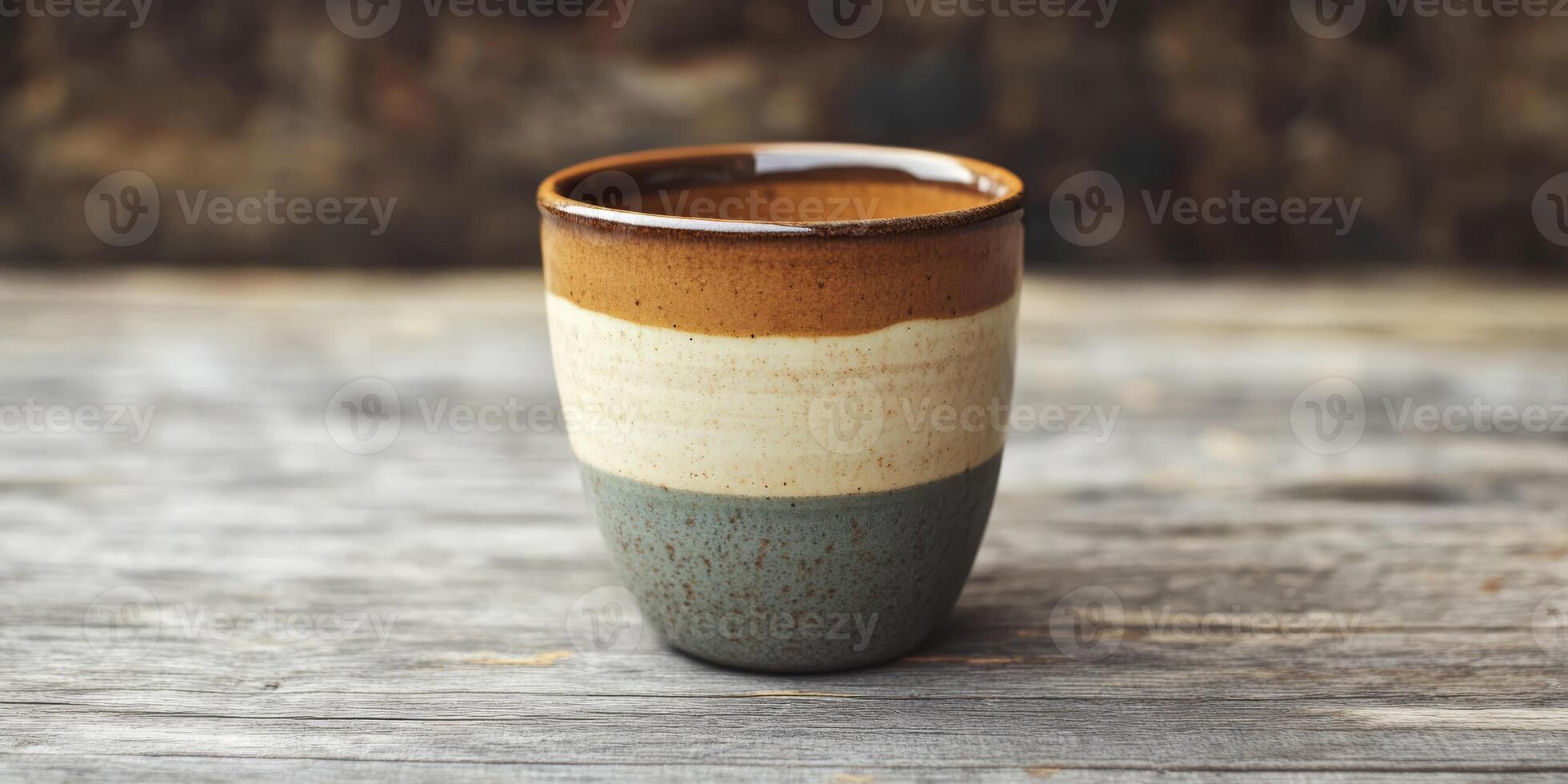 This exquisite ceramic coffee cup, crafted with warm earthy tones, enhances your beverage experience, making it the perfect choice for savoring your favorite drinks in style and comfort photo