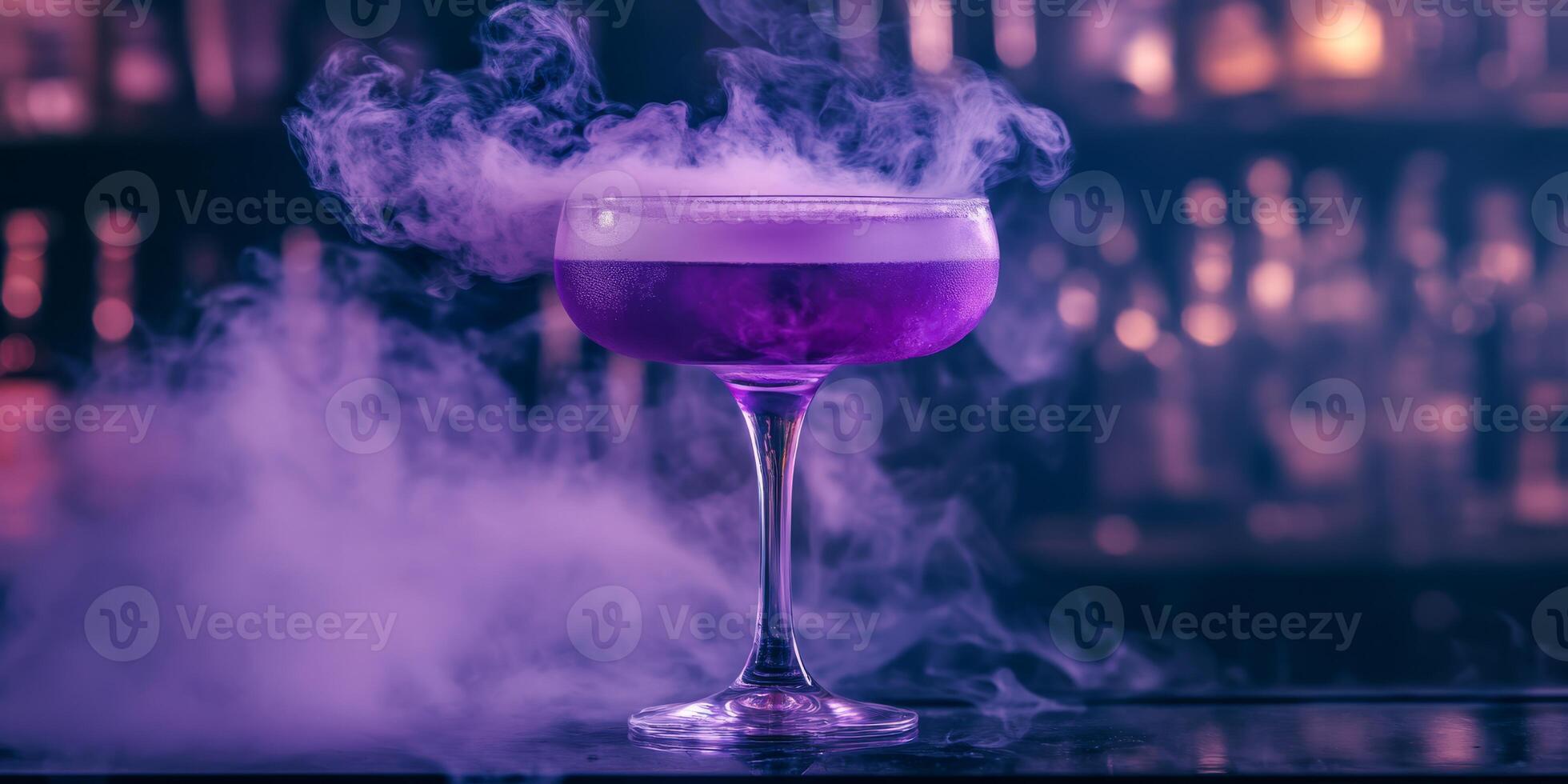 A truly mesmerizing cocktail that boasts vibrant, eyecatching purple hues and delightful, ethereal fog swirling around it, making it ideal for striking visuals and innovative mixology experiences photo