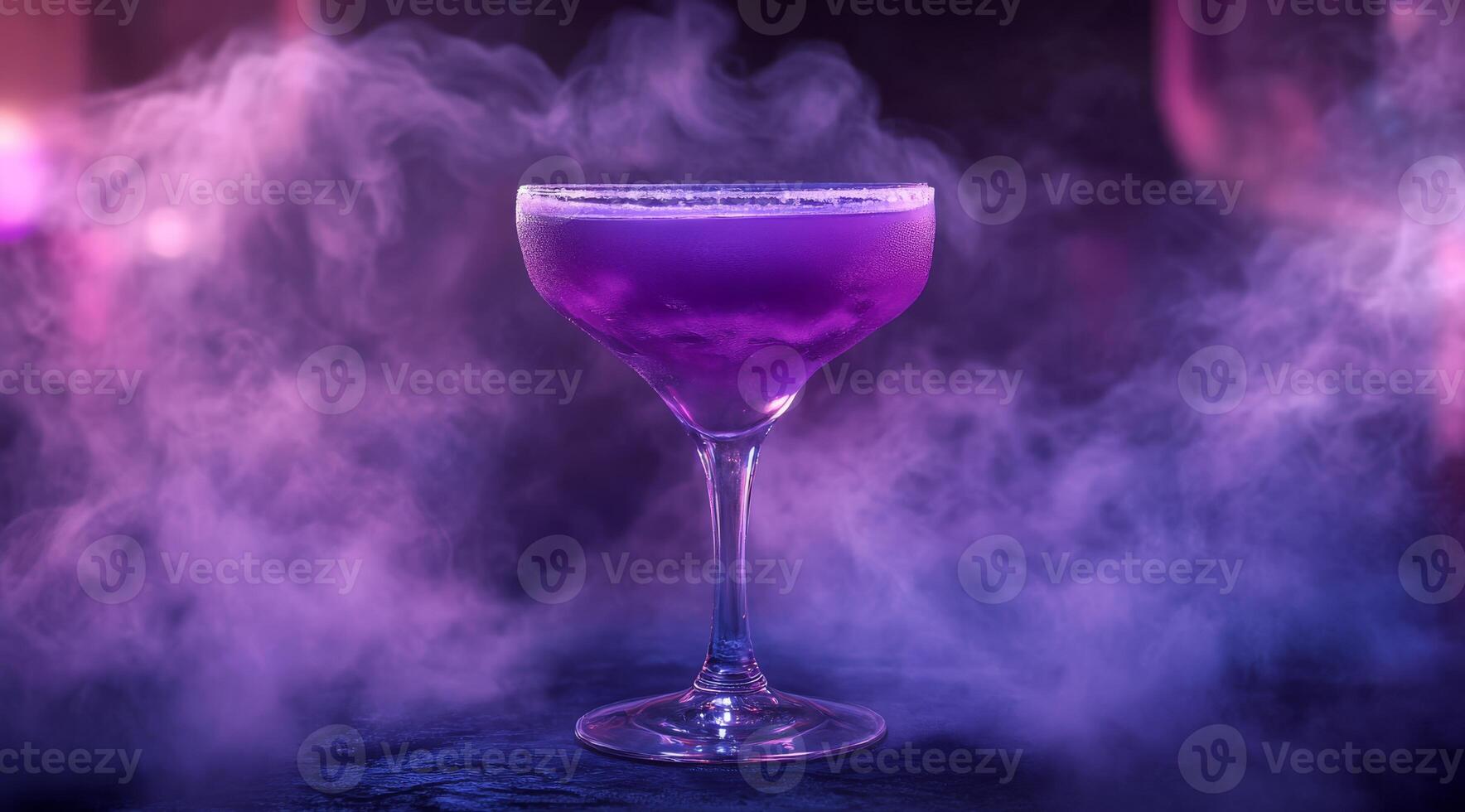 A truly stunning purple cocktail is surrounded by a mesmerizing and enchanting fog, which is artfully created using liquid nitrogen, ensuring a captivating and unforgettable presentation for all photo