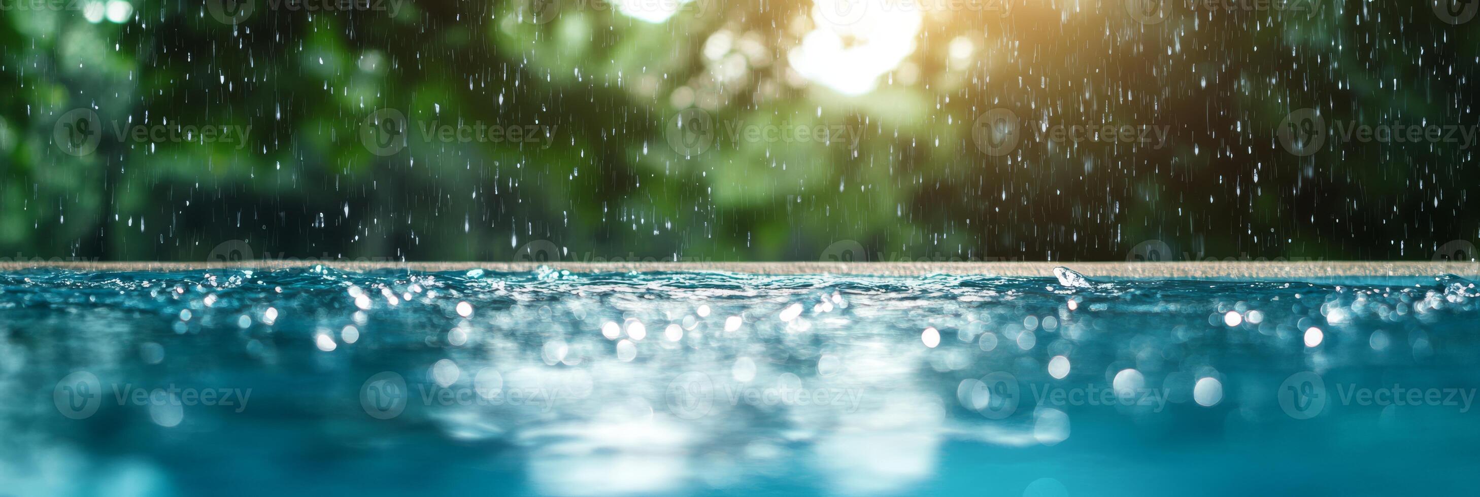 A blissful scene shows raindrops splashing on smooth water, framed by a softly blurred natural backdrop, creating a sense of peace and vibrant life throughout the colorful scenery photo