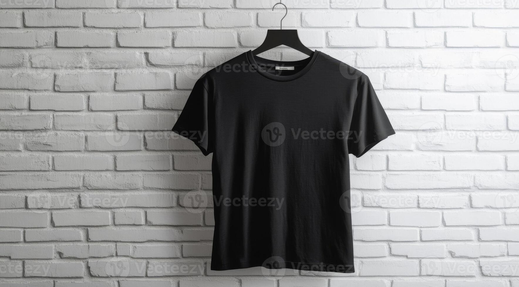 A stylish black tshirt is beautifully displayed on a hanger within a contemporary brick wall setting photo