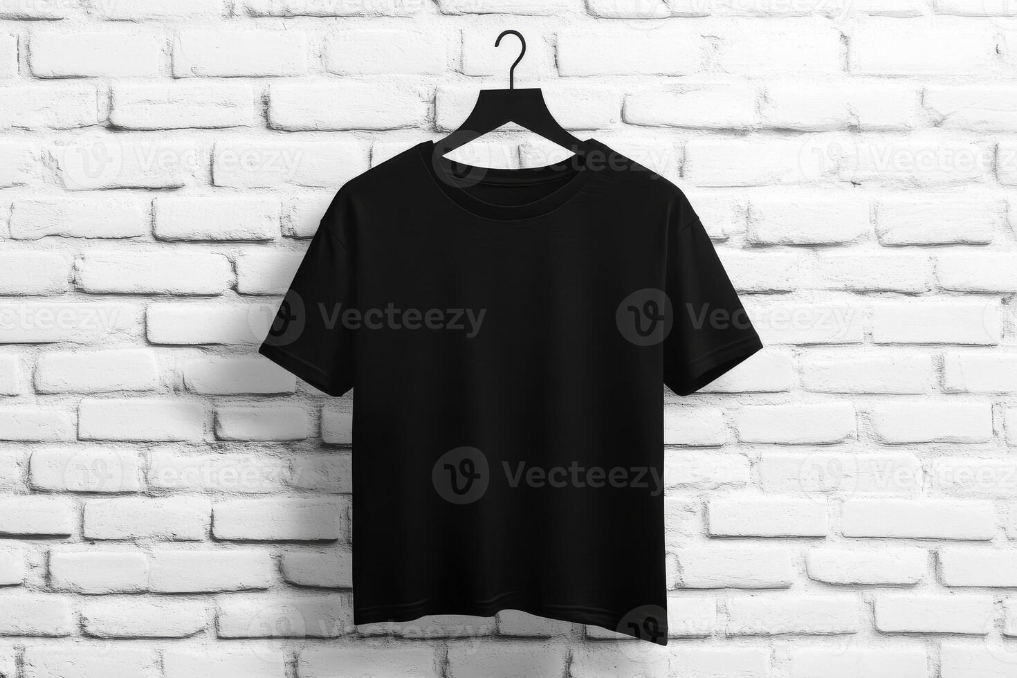 A sleek black tshirt is elegantly displayed on a stylish hanger, making it perfect for minimalistic fashion lovers photo