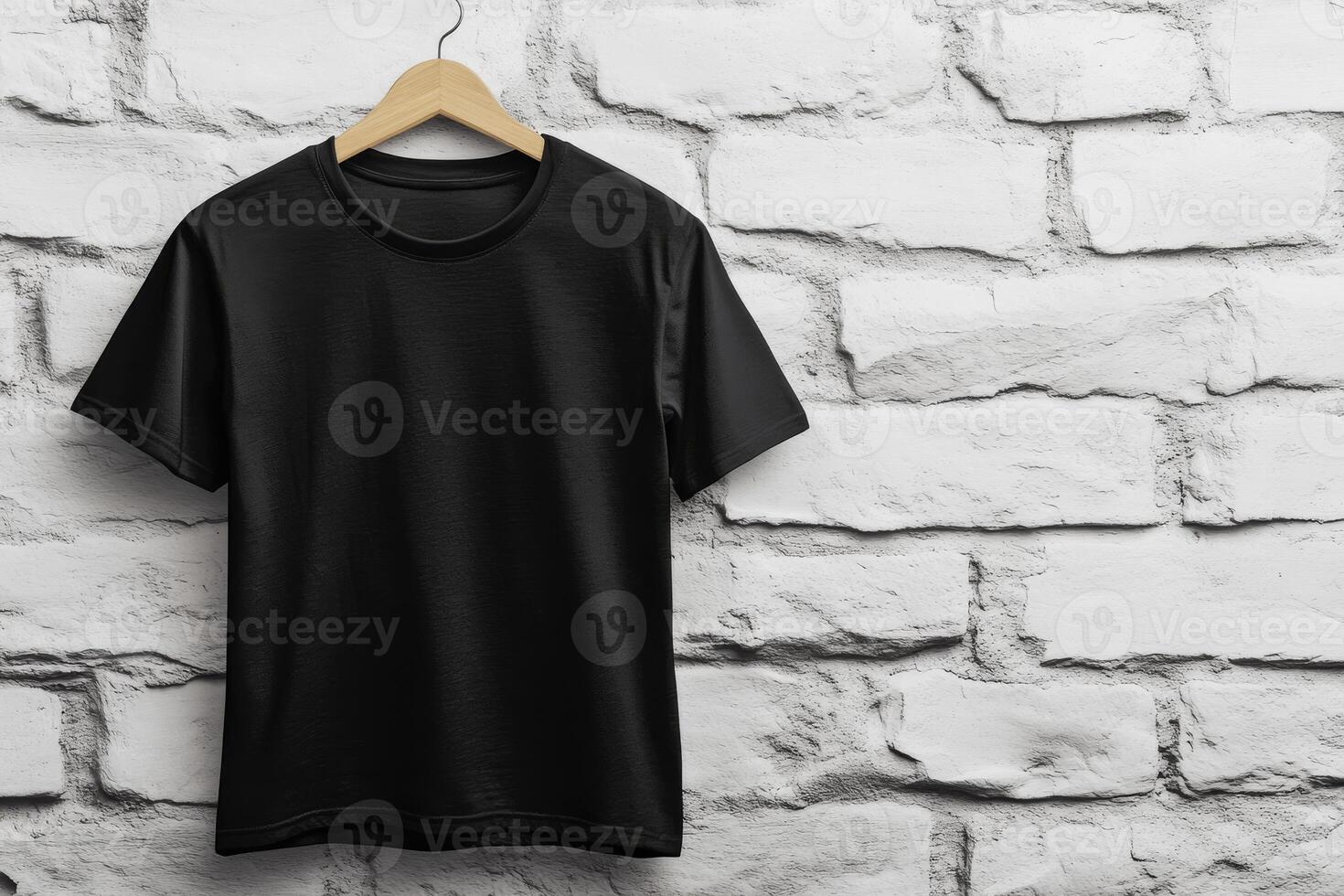 A sleek and stylish black tshirt is beautifully displayed against a textured brick wall background for visual impact photo