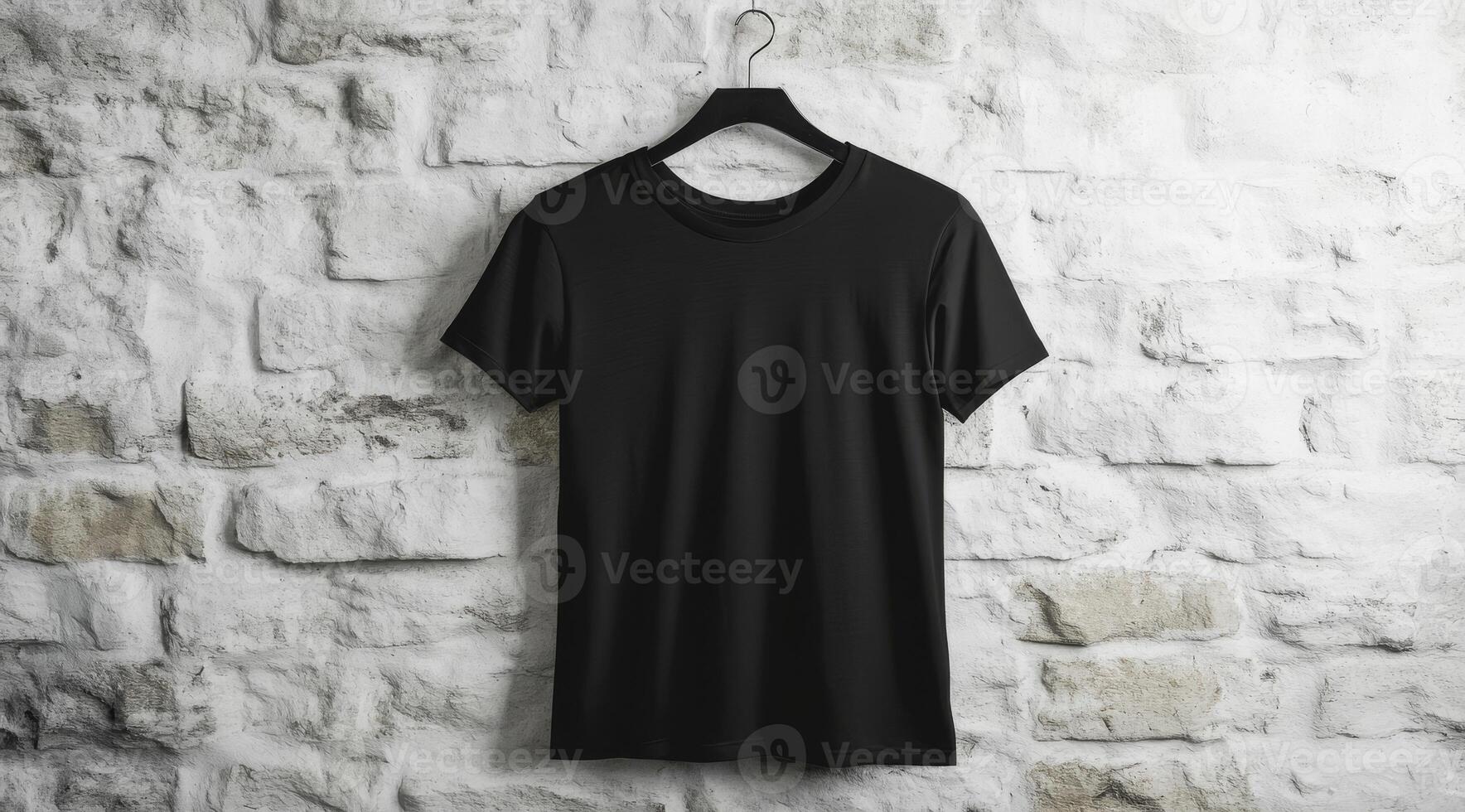 A beautifully stylish black tshirt elegantly displayed against a textured stone wall, ideal for modern fashion lovers photo