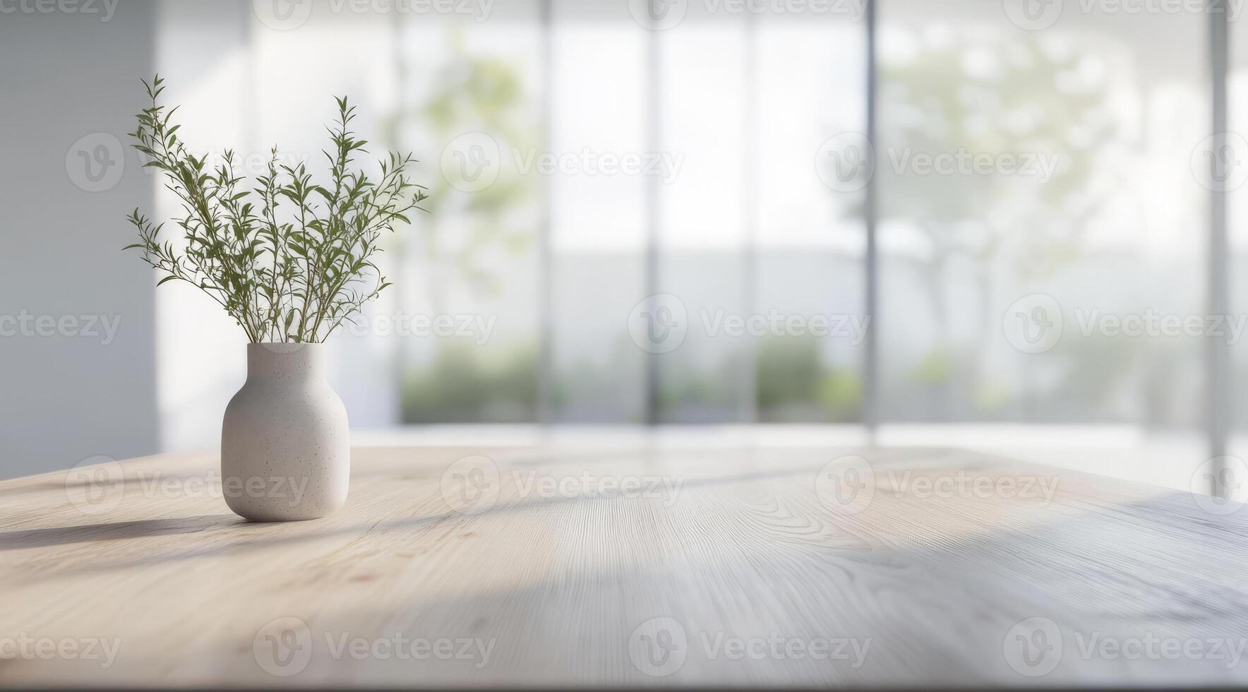 A soft focus reveals a Scandinavian interior with a minimalist table adorned by a graceful vase of greenery, creating a serene and inviting atmosphere that promotes relaxation and warmth photo