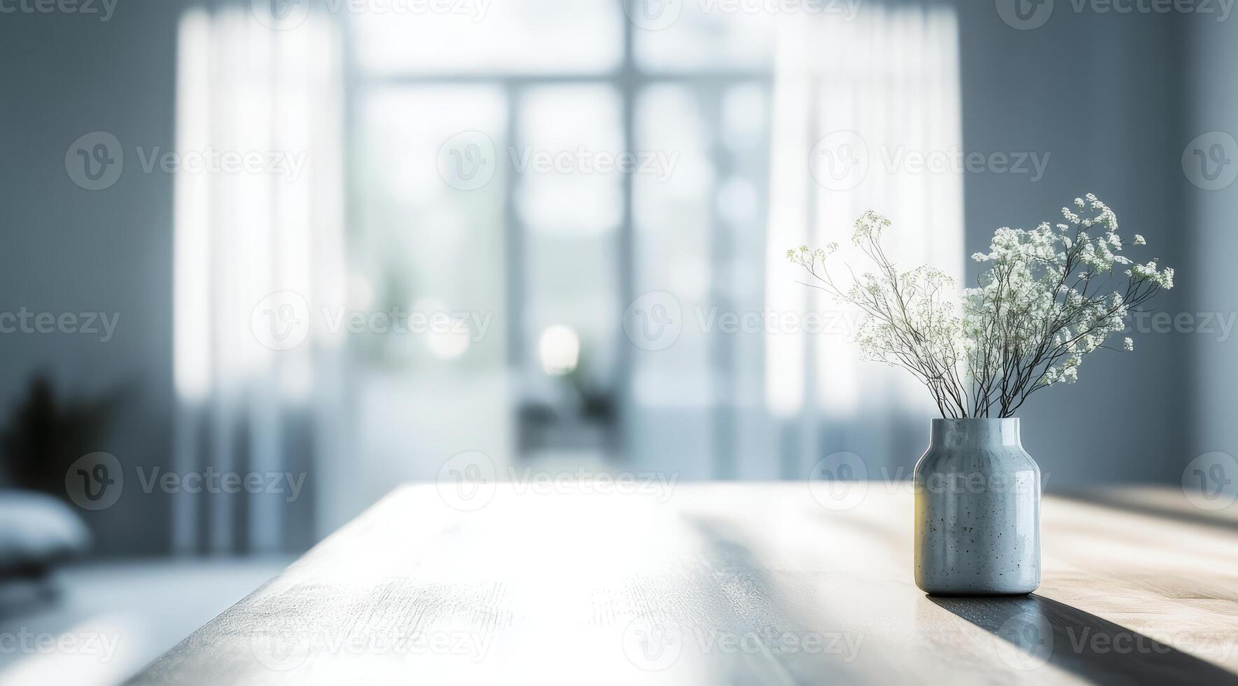 A serene Scandinavian interior features a blurred background, showcasing a delicate vase of vibrant flowers on a rustic table, embodying minimalistic elegance and creating a warm, inviting atmosphere photo