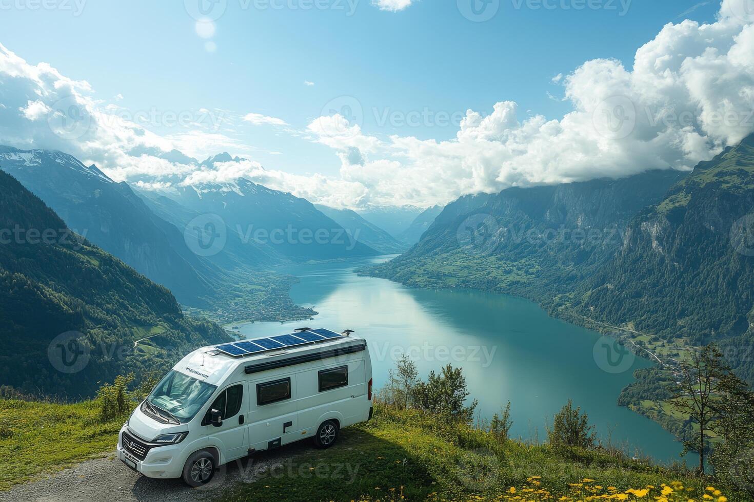 A picturesque campervan is parked in a breathtaking natural landscape, featuring a solar panel, which promotes sustainable travel and ecofriendly adventures amidst stunning, serene views of nature photo
