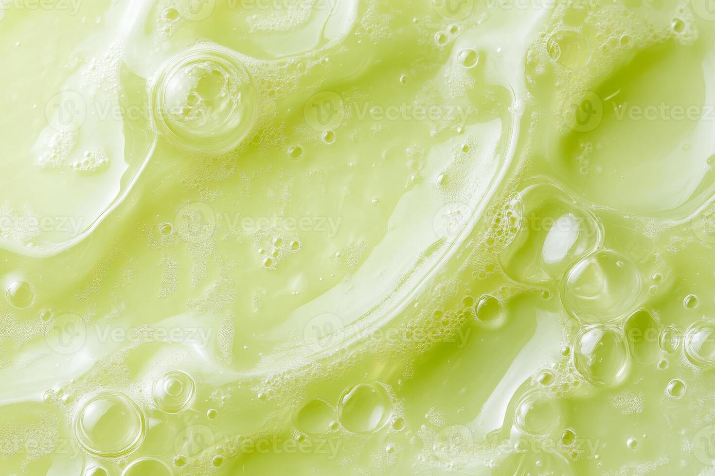 This macro view of a vibrant green serum emphasizes its exceptionally smooth texture and tiny bubbles, which together symbolize a deep sense of wellness and the essence of natural skincare photo