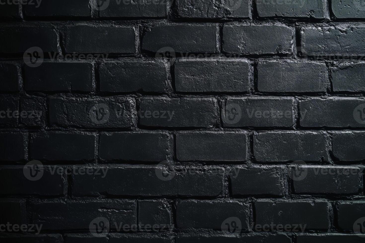 A closeup shot of a beautifully textured black brick wall, highlighting its striking monochrome pattern and minimalistic design that can be used for a variety of creative purposes and projects photo