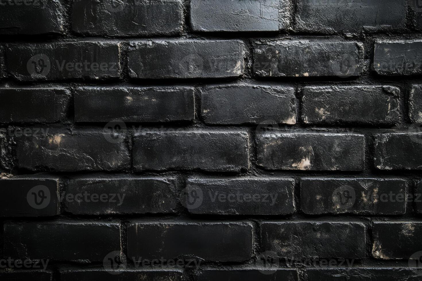 This captivating image shows a closeup of a black brick wall with a unique textured surface and intricate patterns, making it ideal for minimalistic design projects and creative endeavors photo