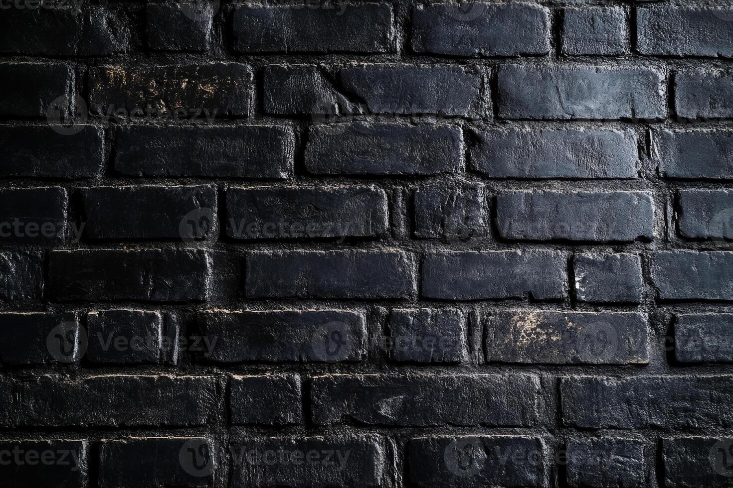 A closeup image of a textured black brick wall, beautifully showcasing minimalism with its unique abstract patterns and dramatic interplay of light and shadows that create depth and interest photo