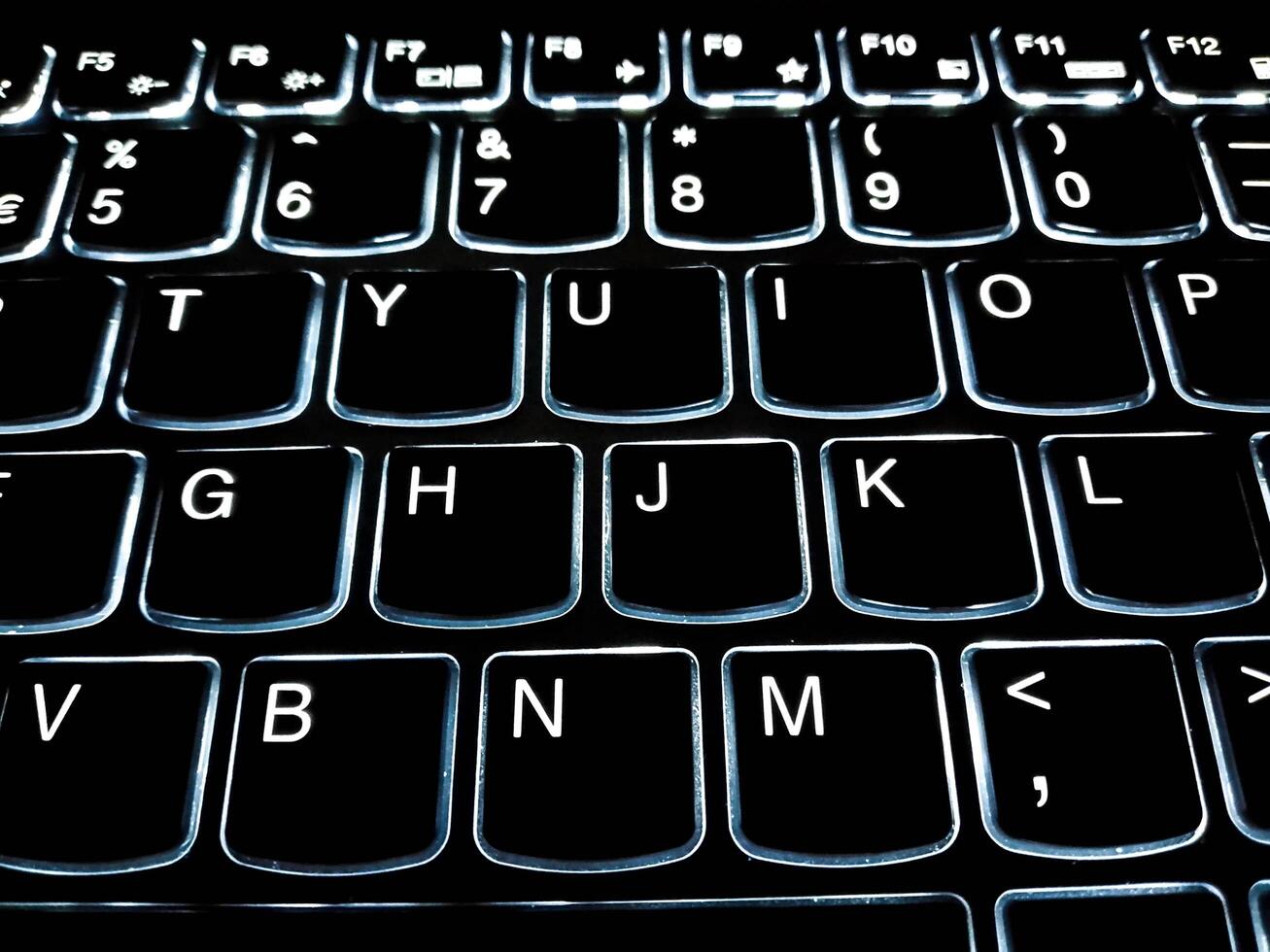 Closup View of Computer Keyboard with backlit keys photo