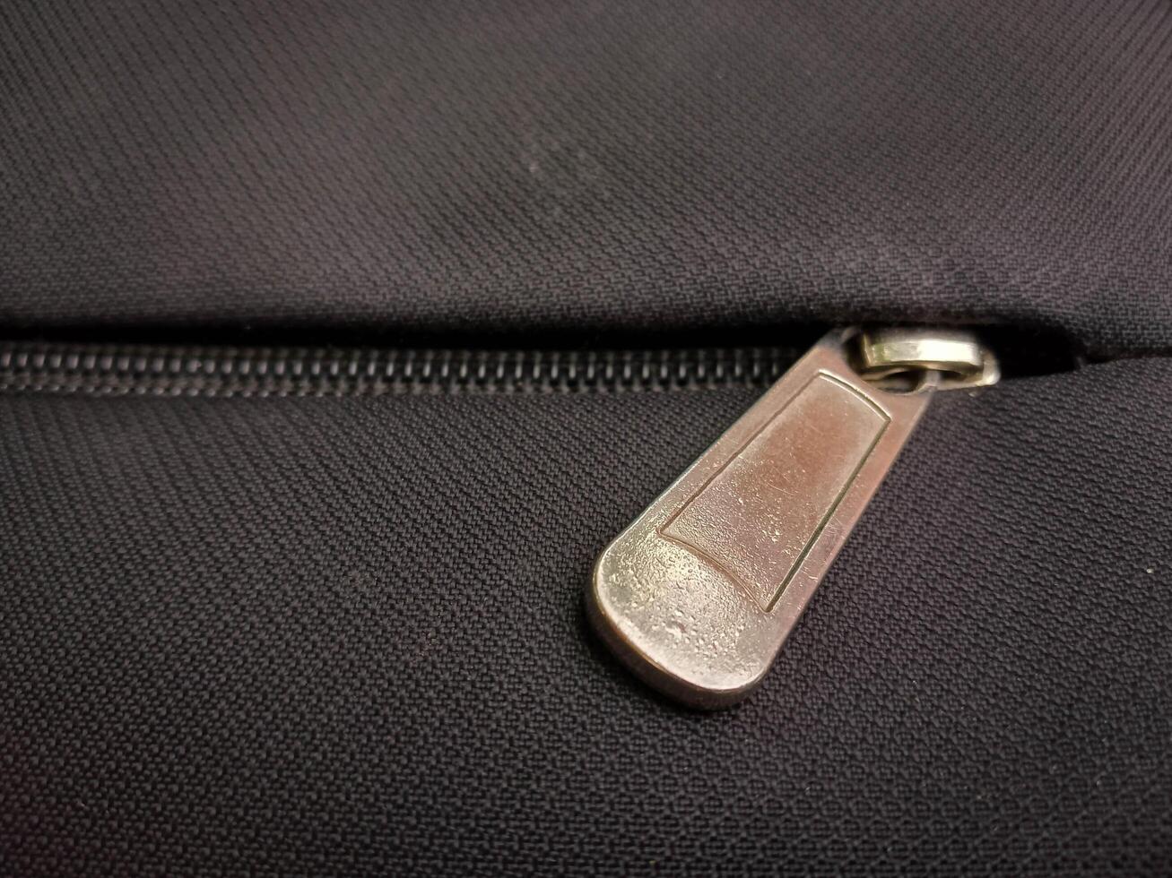 Closeup view of Bag Zip - Zip slider photo