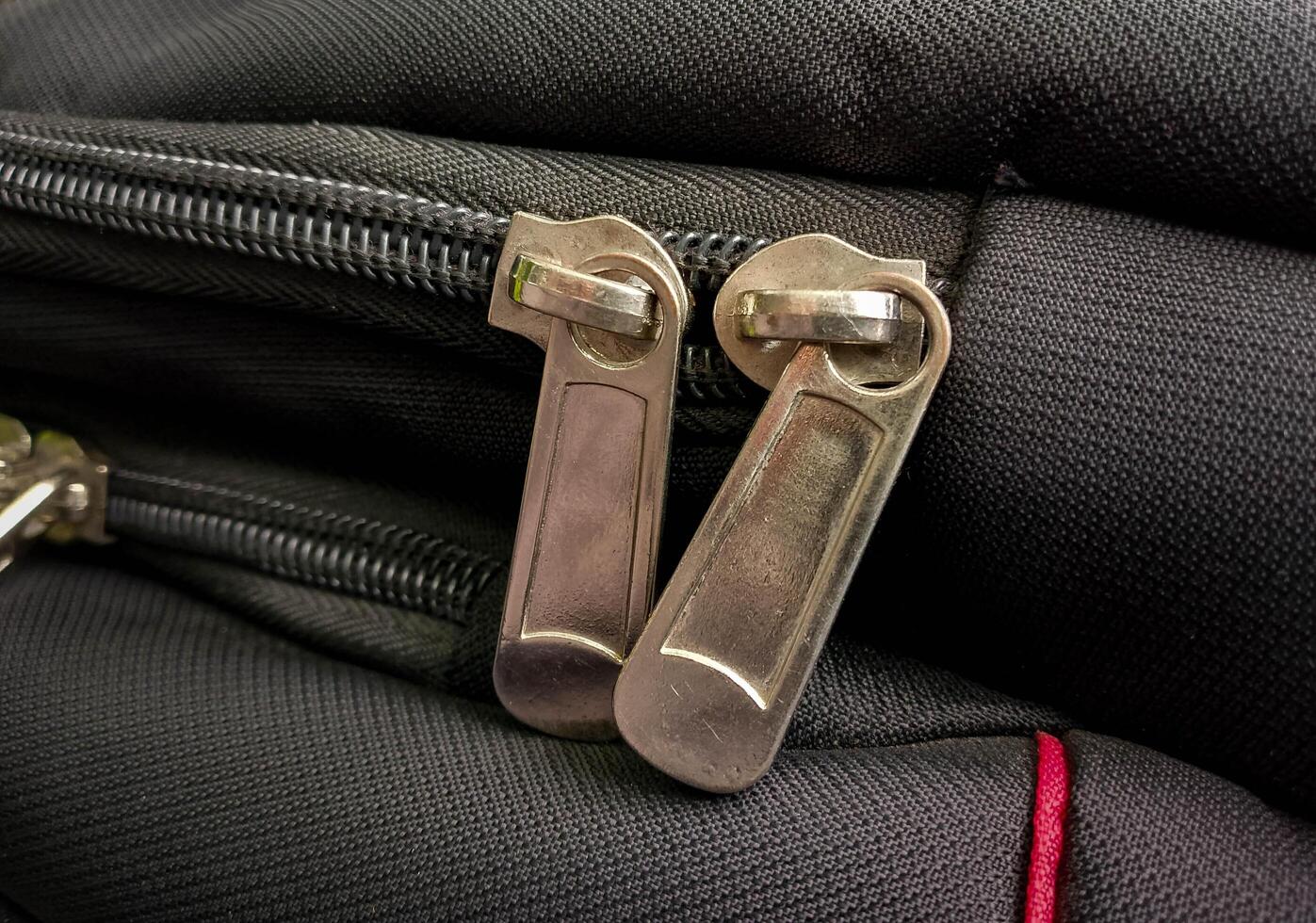 Closeup view of Bag Zip - Zip slider photo