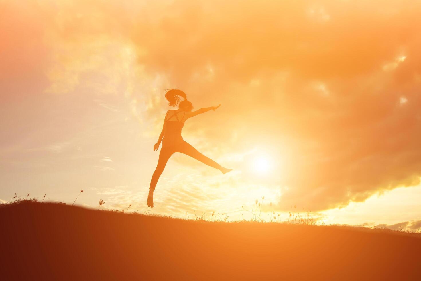 silhouette woman Jump with happy photo