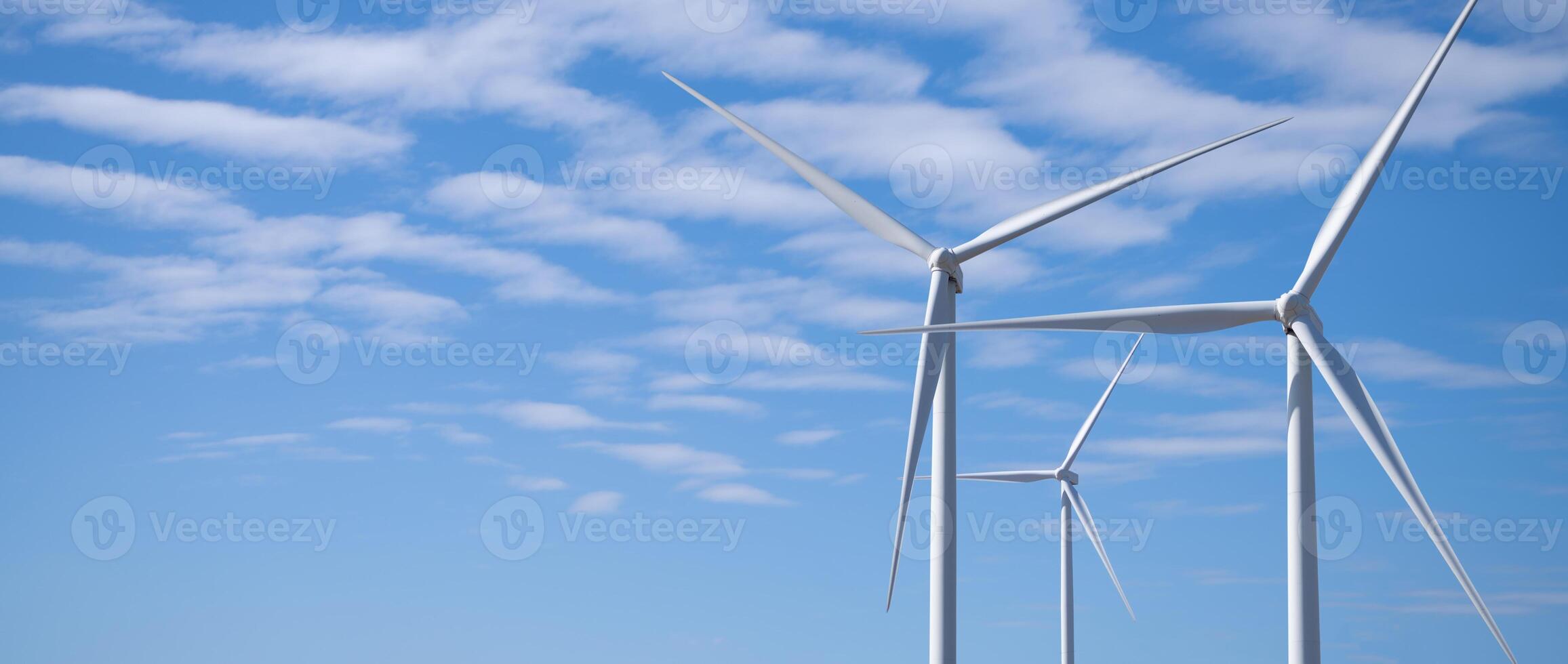 Wind energy and sustainable power generation with wind turbines, Eco-friendly solutions for renewable resources. Wind power farm and sustainable development of renewable energy, green technology. photo