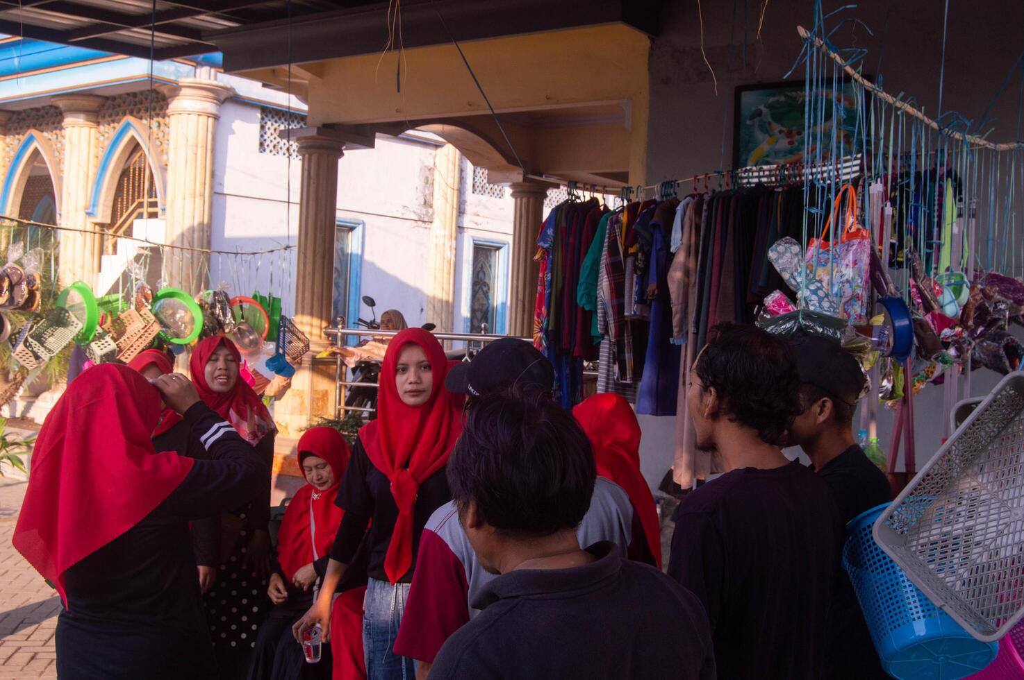 Gresik, Indonesia, 20 August 2023 - Village residents who were gathering at an event in the community area. photo