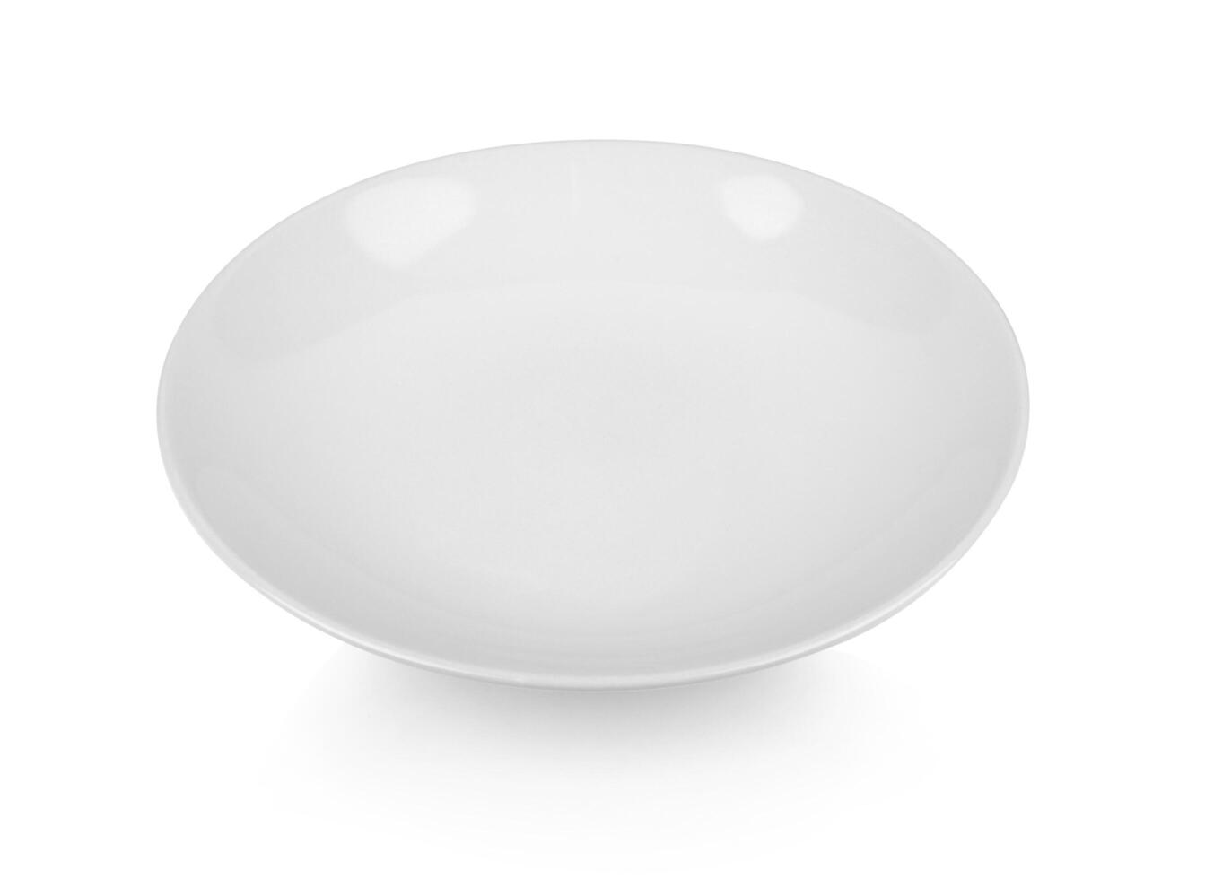 white ceramic plate on white blackground. photo