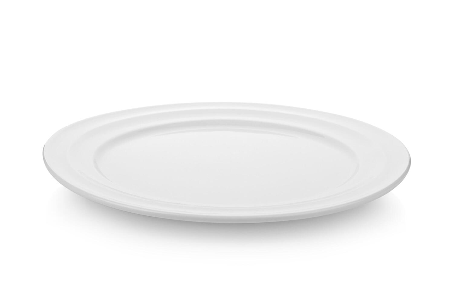 White plate isolated on white background photo