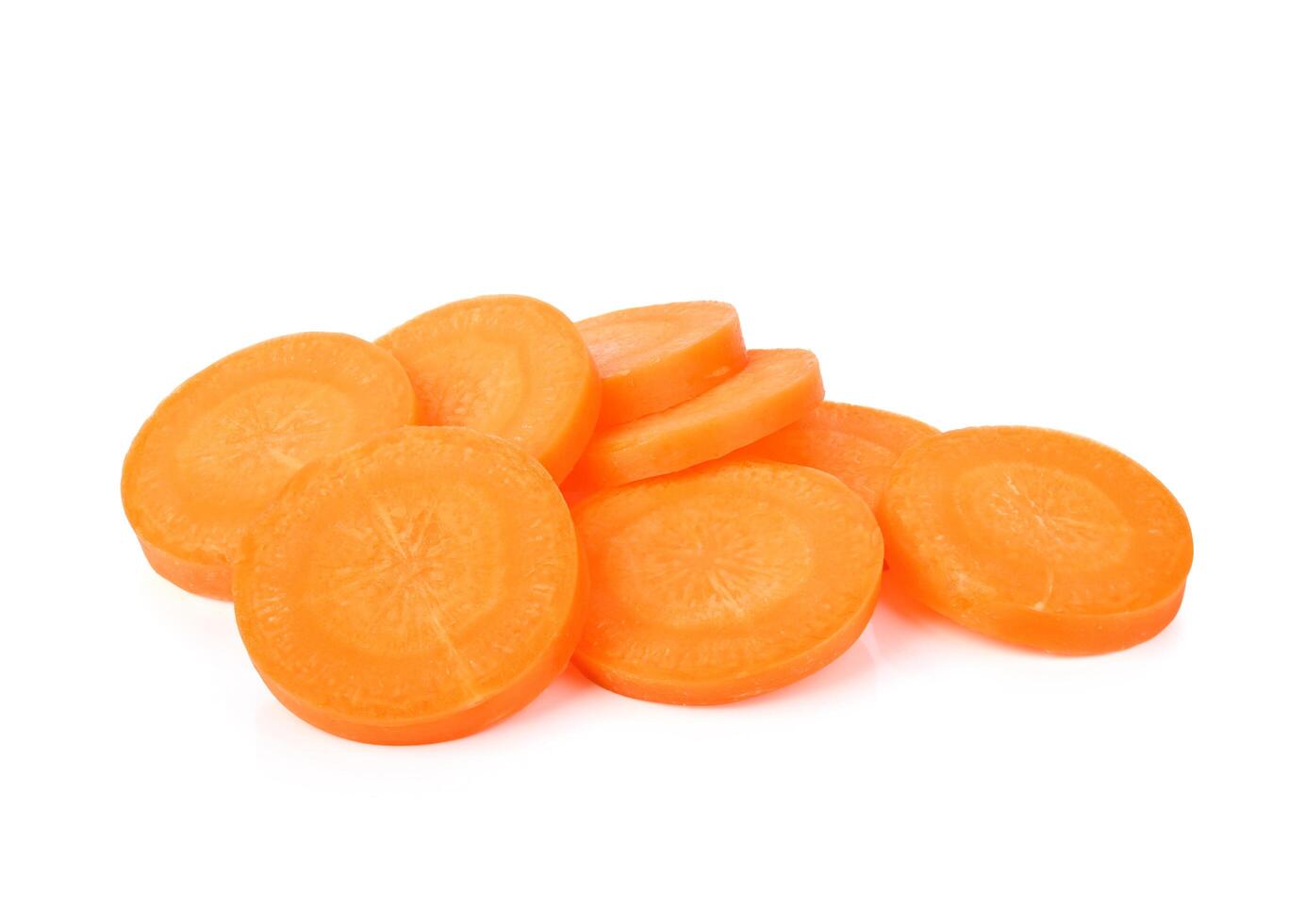 round slices, carrots slices isolated on white background. photo