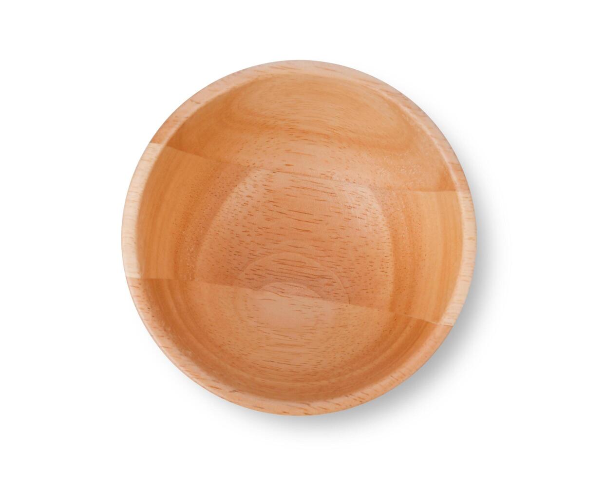 wooden bowl on white background. Top view photo