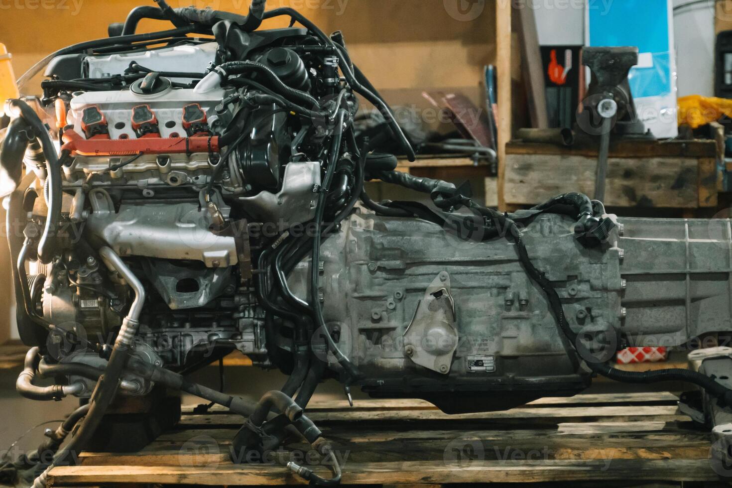 Disassembled car engine block at car service station photo