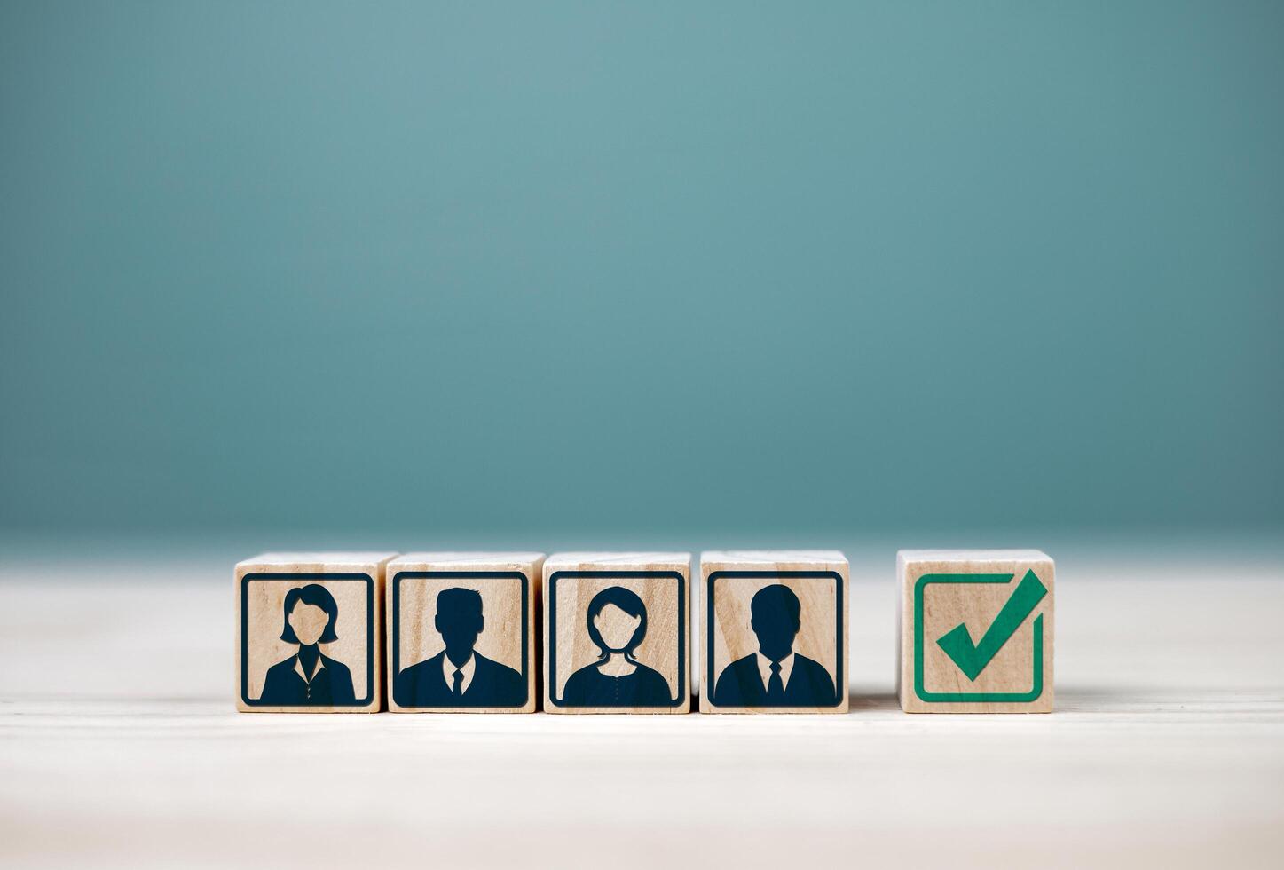 Testing, quality assessment, and selection of applicants. Wooden block with human icon with copy space. Concepts of human resource management, examination of qualifications in organizations photo
