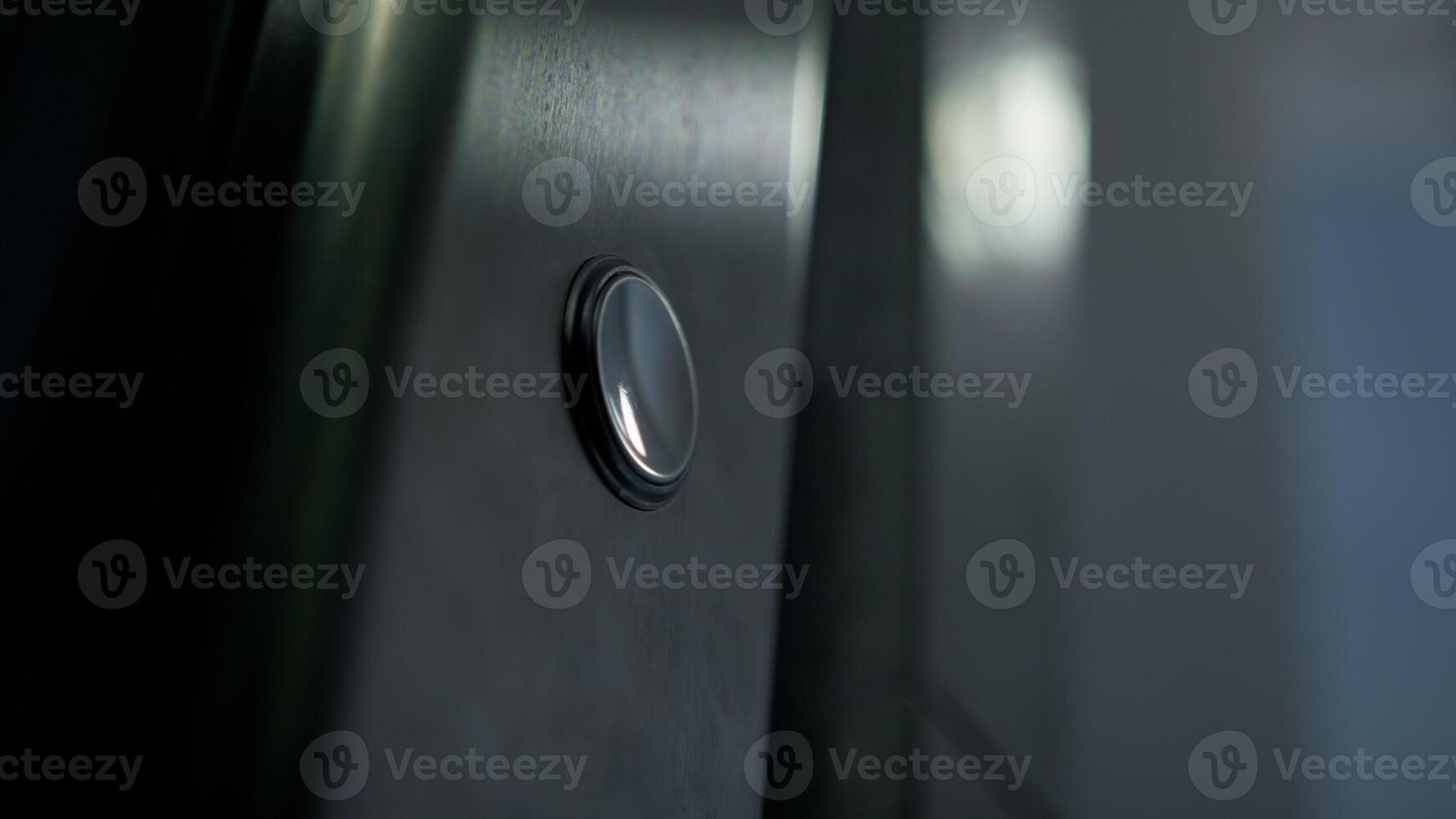 Finger Of Man Pressing Button For Call The Elevator In The Palace photo